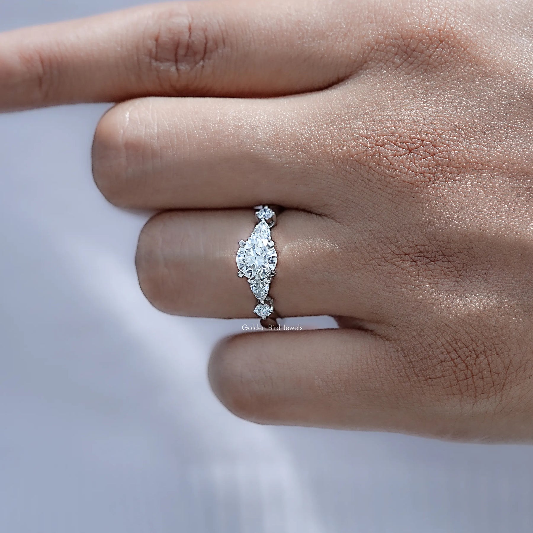 Detailed view of Round And Pear Cut Diamond Five Stone Ring