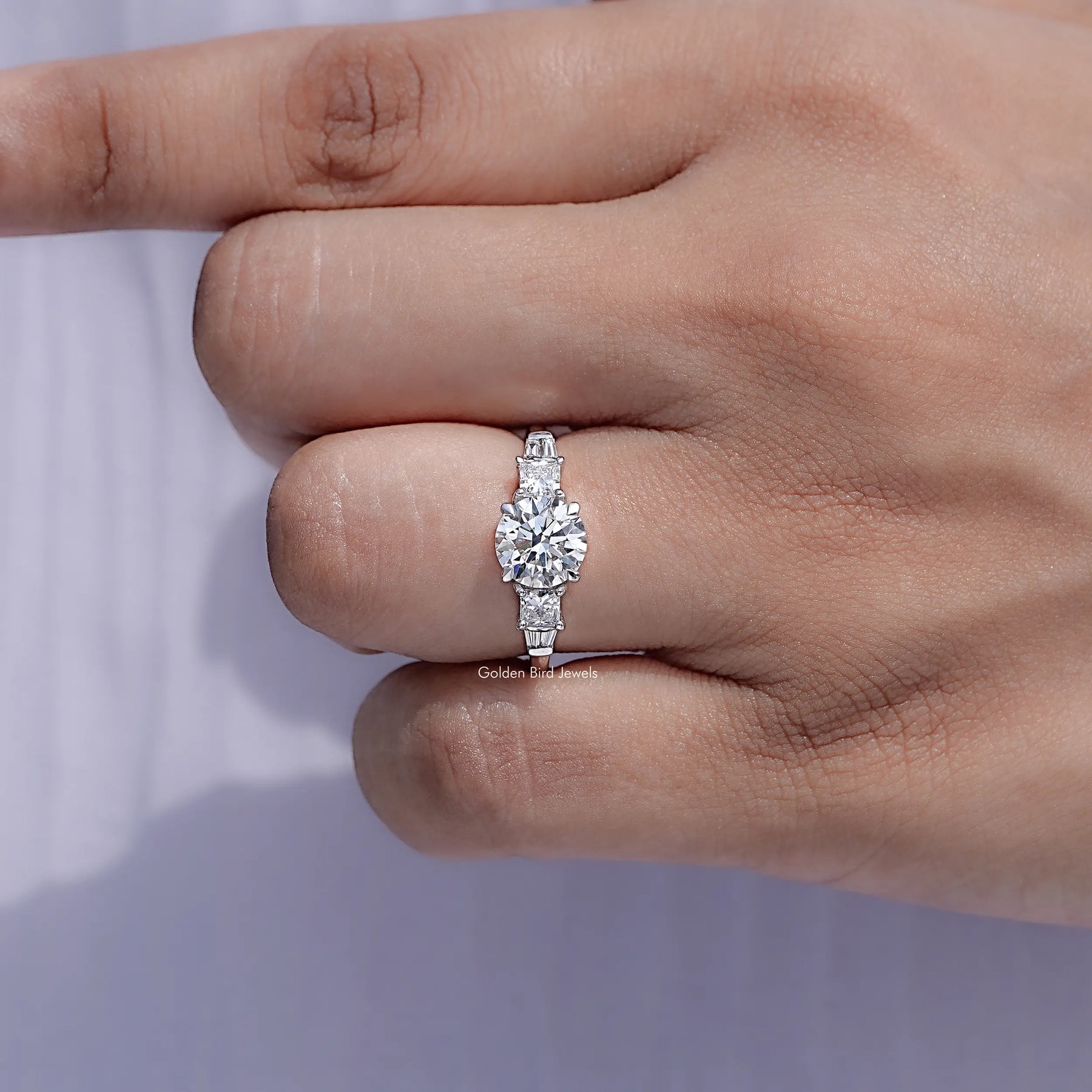 Detailed view of Round And Princess Diamond Five Stone Ring