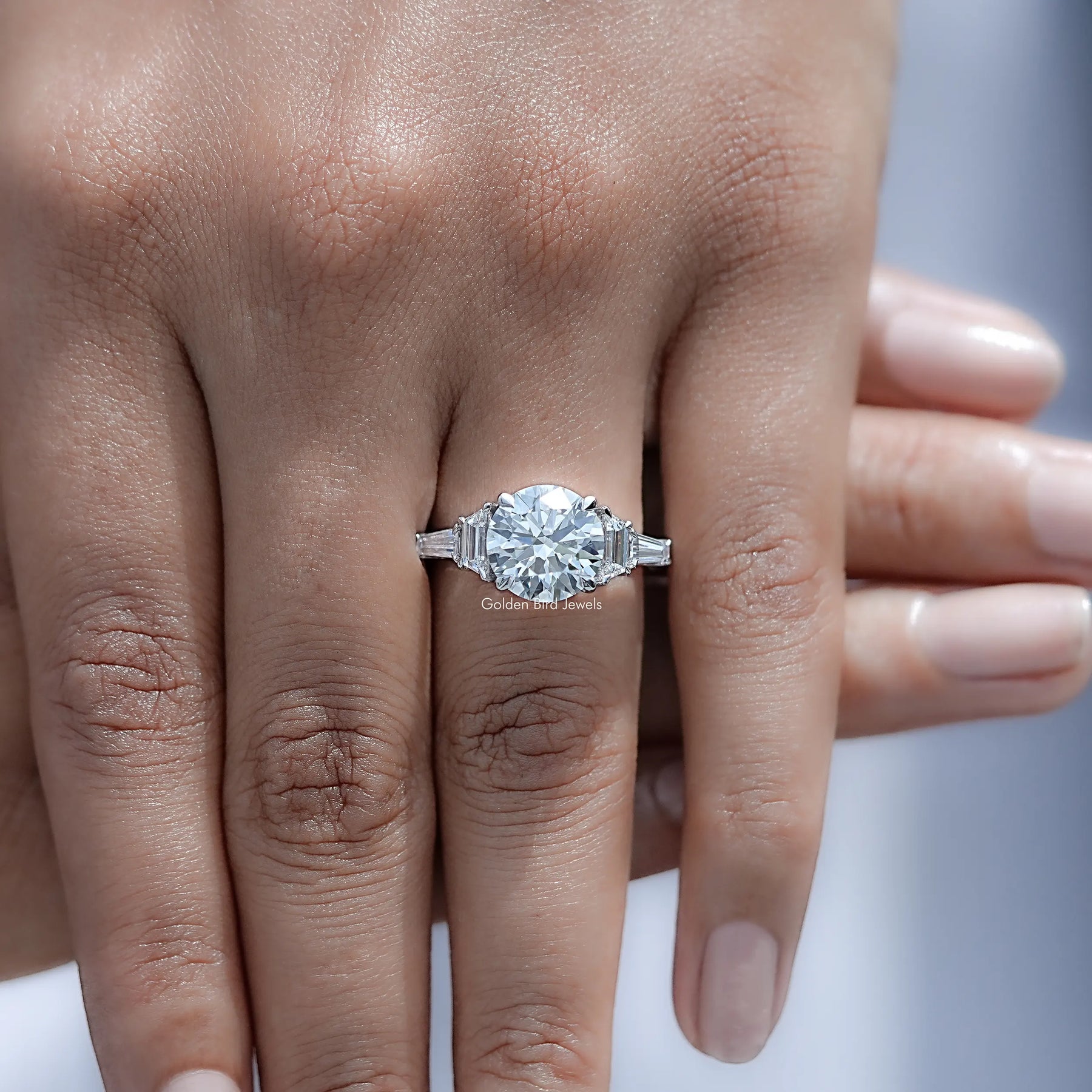 Top view of Round And Step Cut Trapezoid Lab Diamond Ring