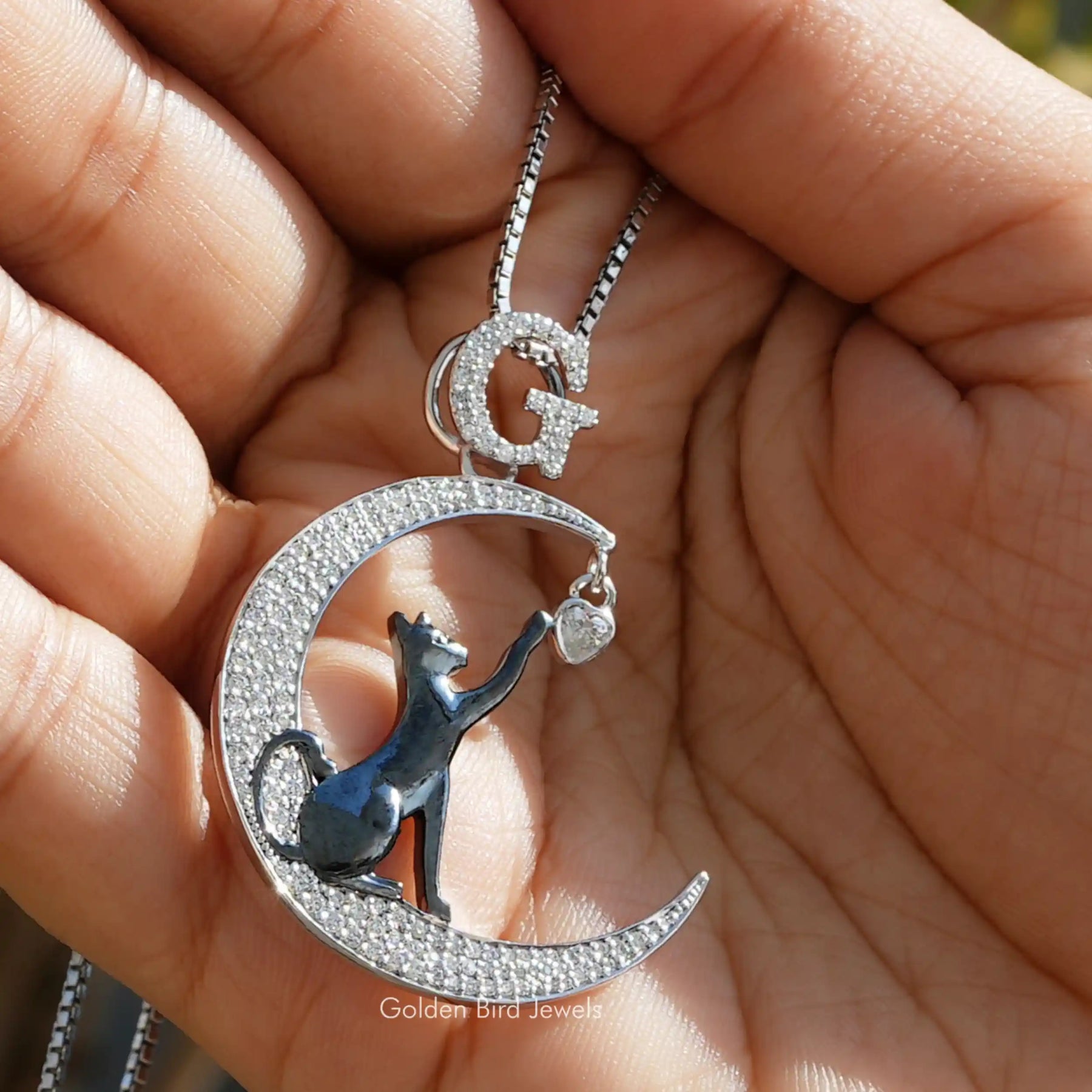 Full view of moissanite pendant in unique shape