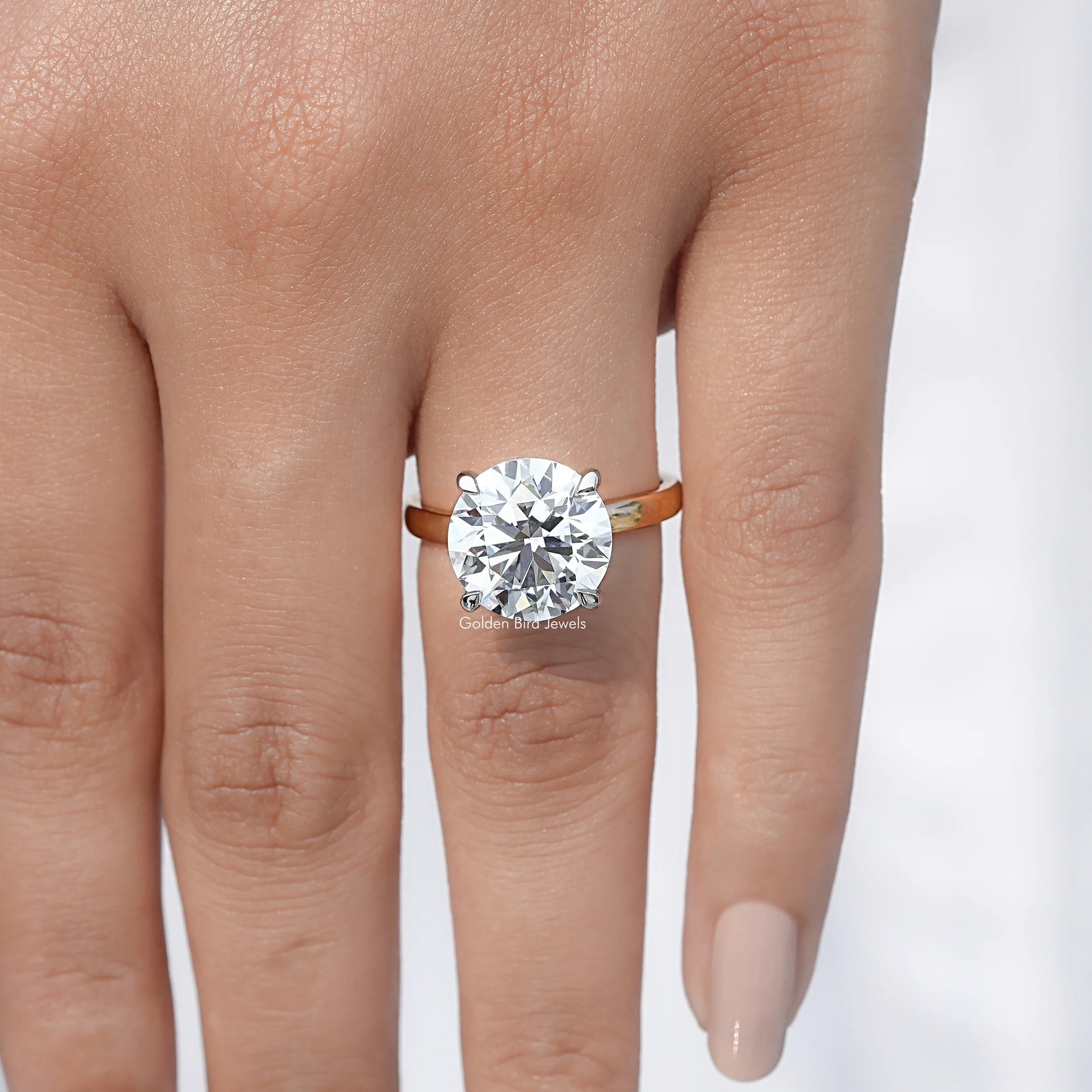 View of Round Cut Diamond Solitaire Engagement Ring In Yellow Gold