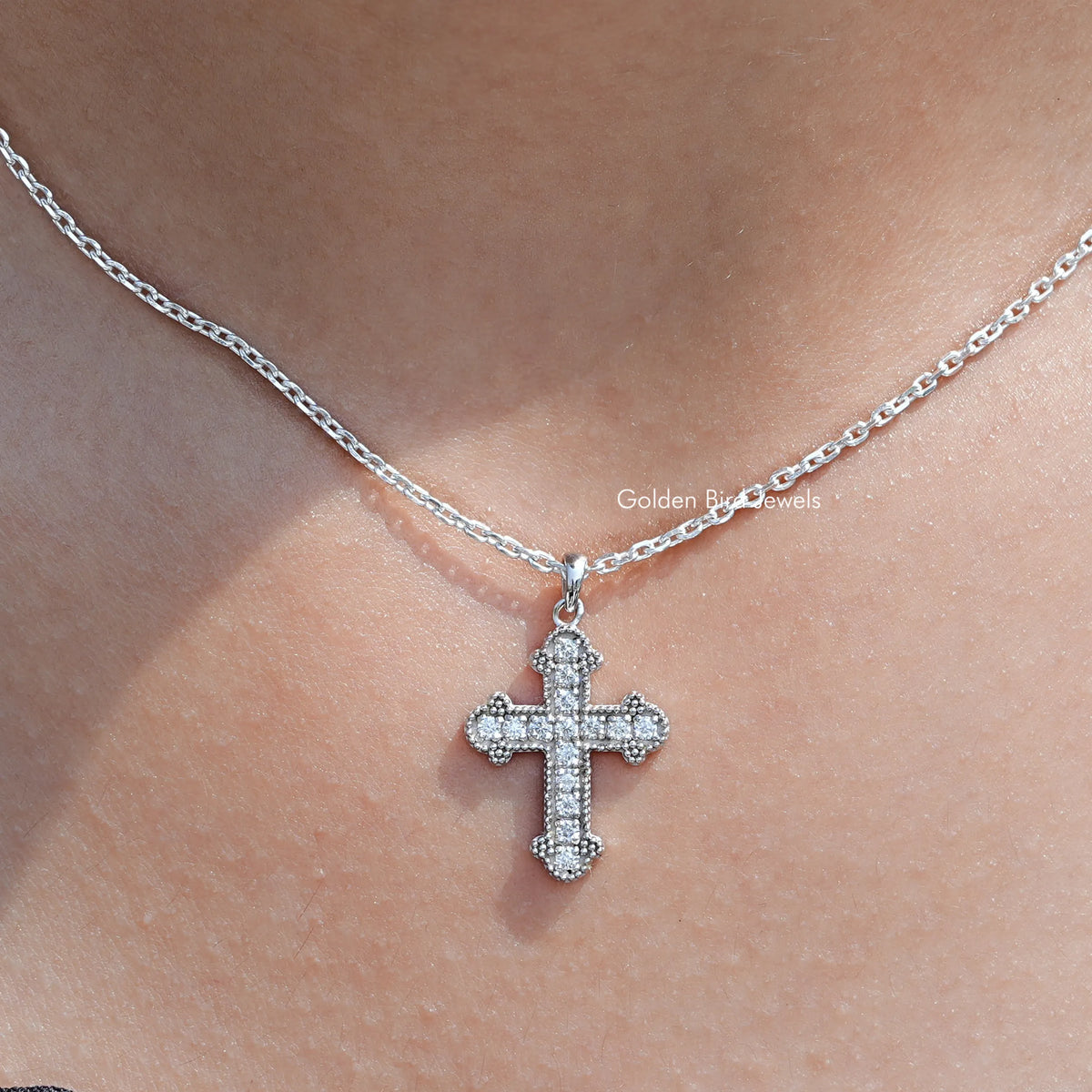 Front view of Round Cut Moissanite Encrusted Cross Pendant