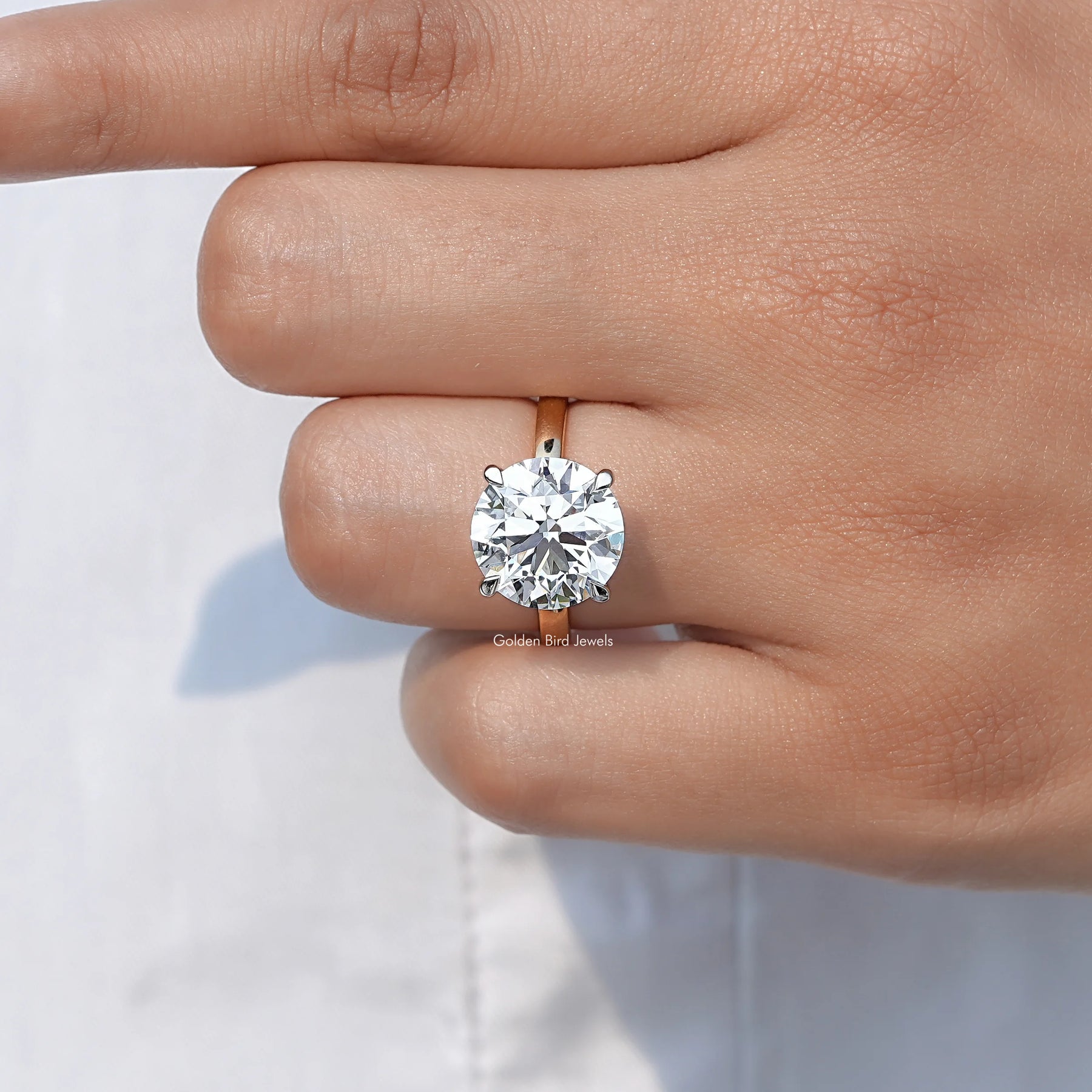 Close-Up View of Round Cut Diamond Hidden Halo Solitaire Ring In Yellow Gold