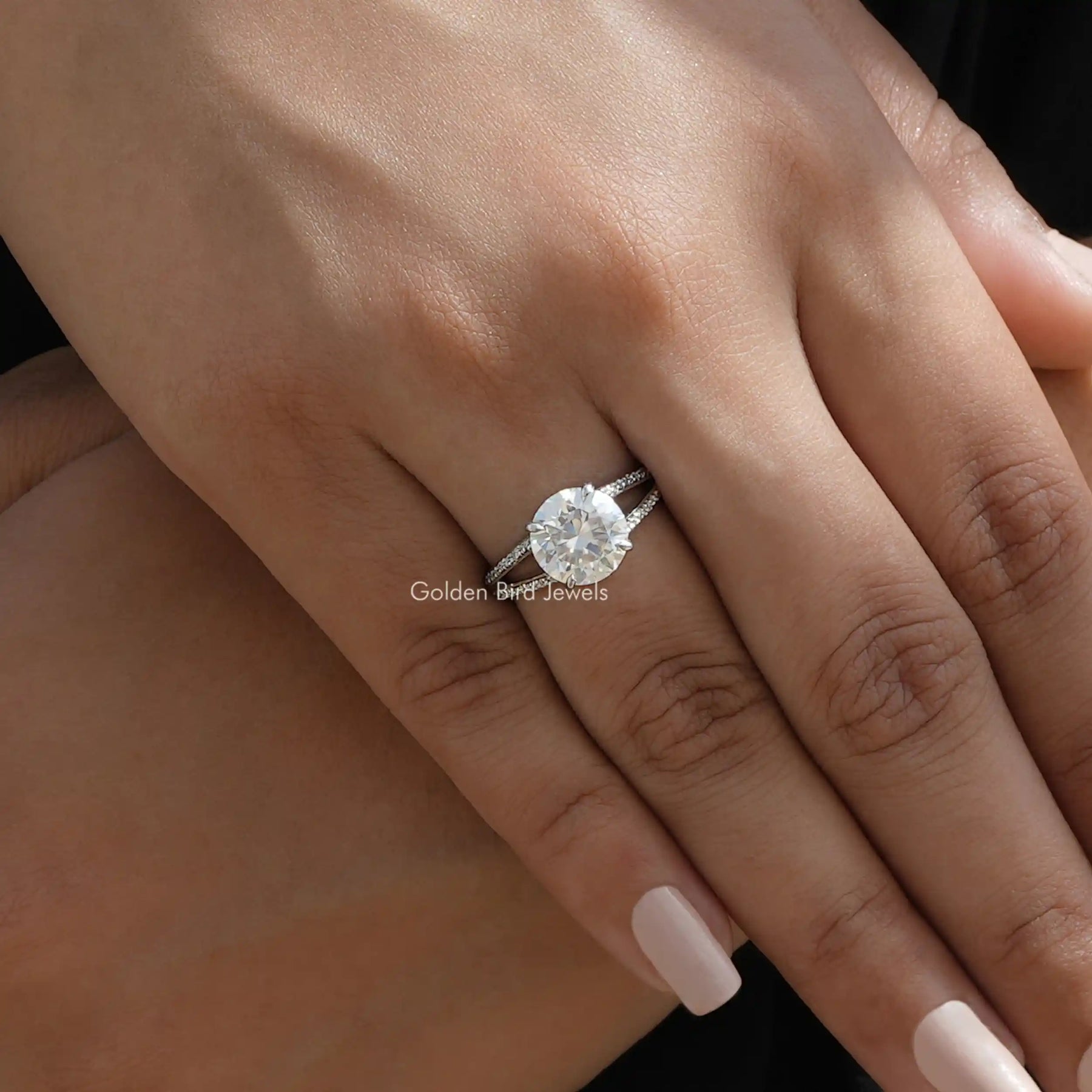 Close-Up View of Round Cut Moissanite Engagement Ring In White Gold