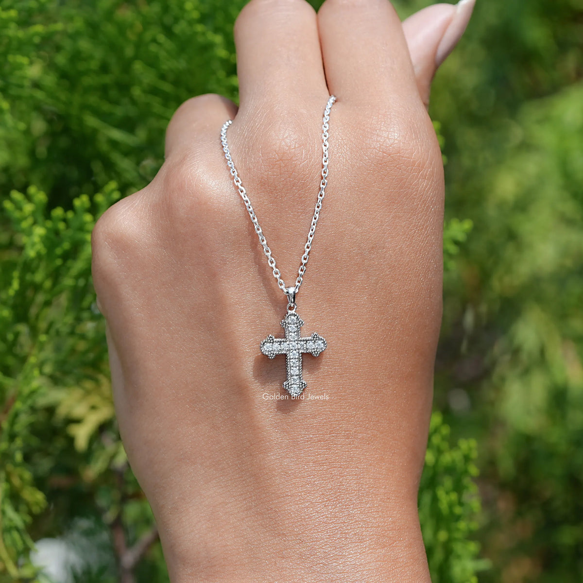 Close View Of Round Cut Moissanite Encrusted Cross Pendant