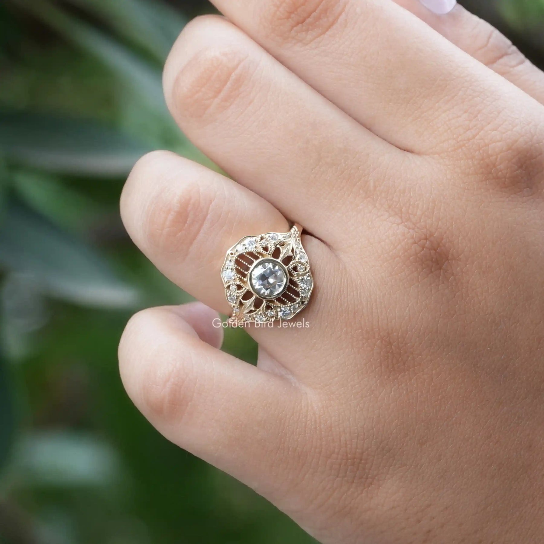 Close-Up View of OEC Round Cut Moissanite Vintage Ring In Yellow Gold