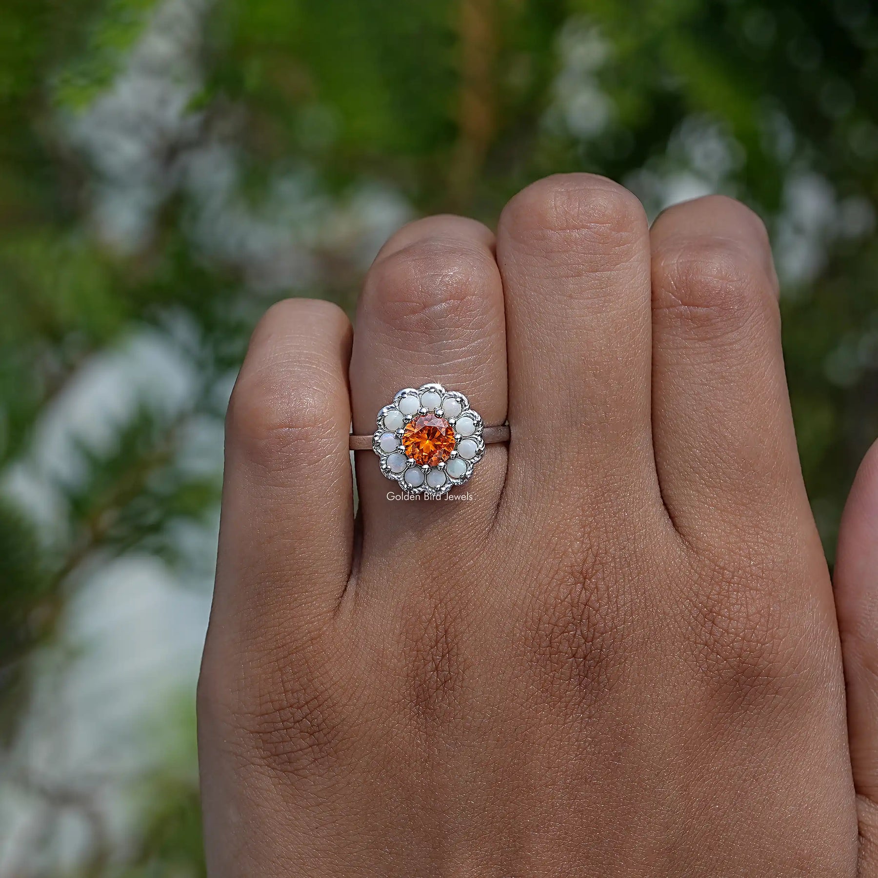 Profile View of Round Cut Sunstone Halo Ring