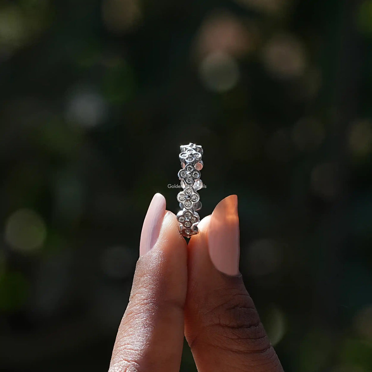 Side View of Lab Grown Diamond Wedding Band & Ring In two fingers