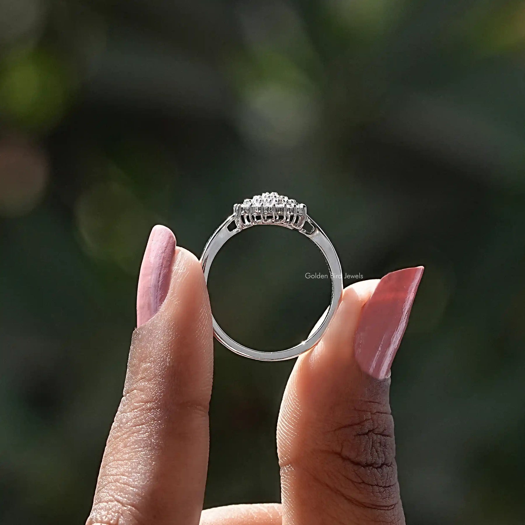 Back view of white gold ring showcasing round lab-grown diamonds.
