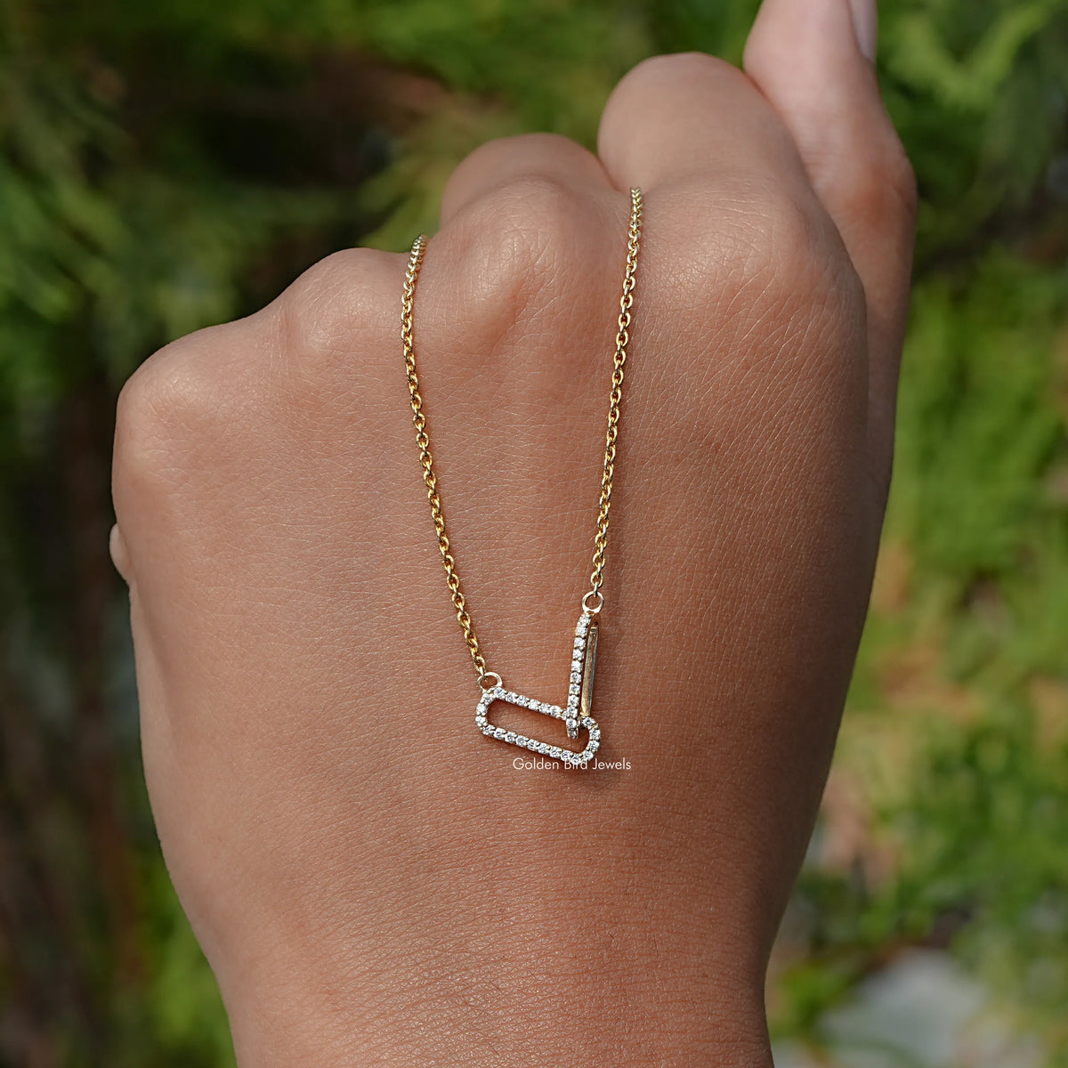 In Hand Holding In the Round Cut Diamond Interlocked Pendant