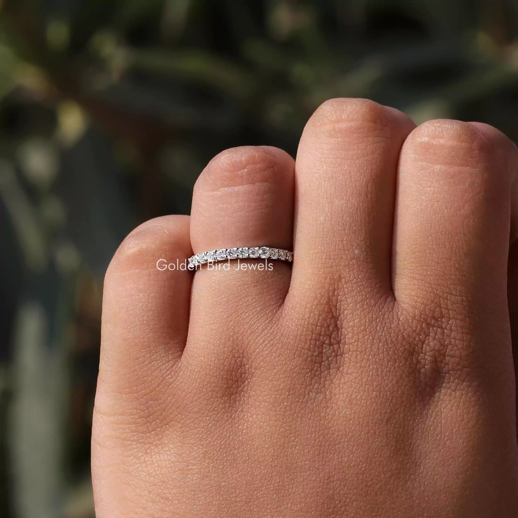 Close view of Blue Round Cut Moissanite Solitaire Ring