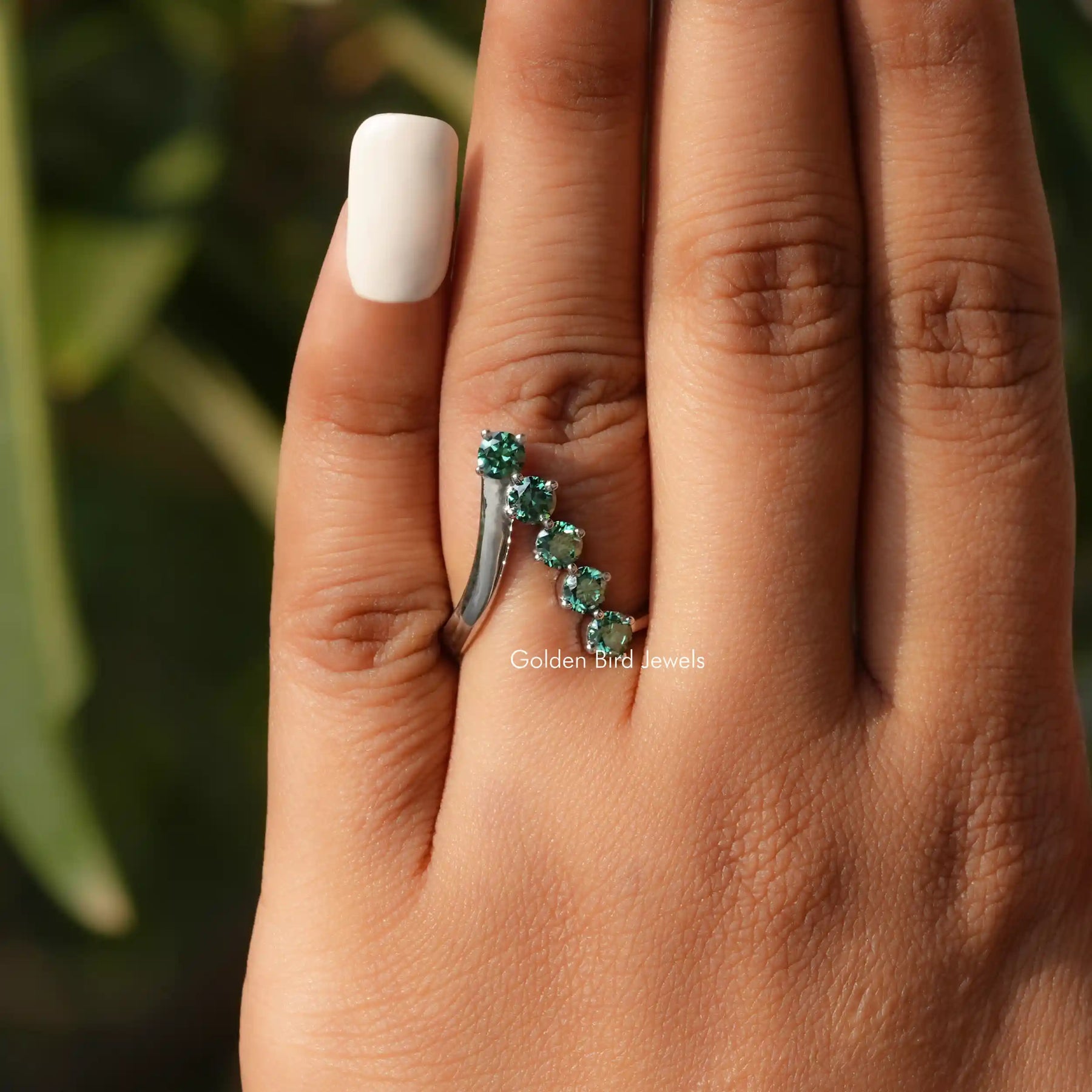 Front View of Round Cut Moissanite Engagement Ring In White Gold