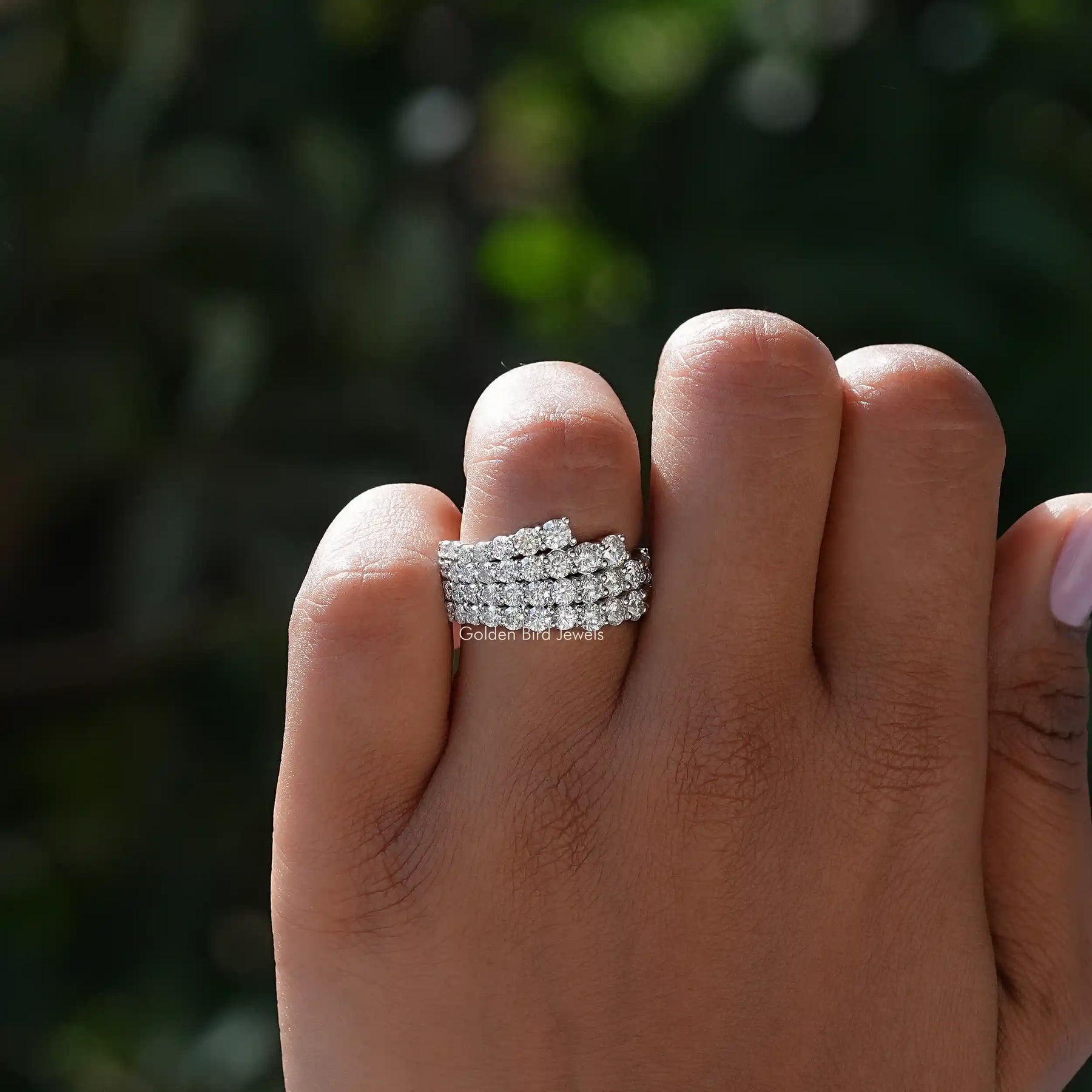 Close-Up View of Round Cut Moissanite Half Eternity Band In White Gold