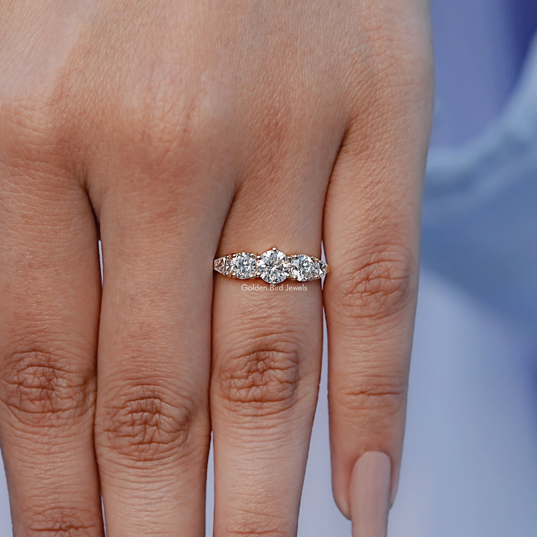 Close-Up View of Shield And Round Cut Lab Diamond Five Stone Ring In Yellow Gold
