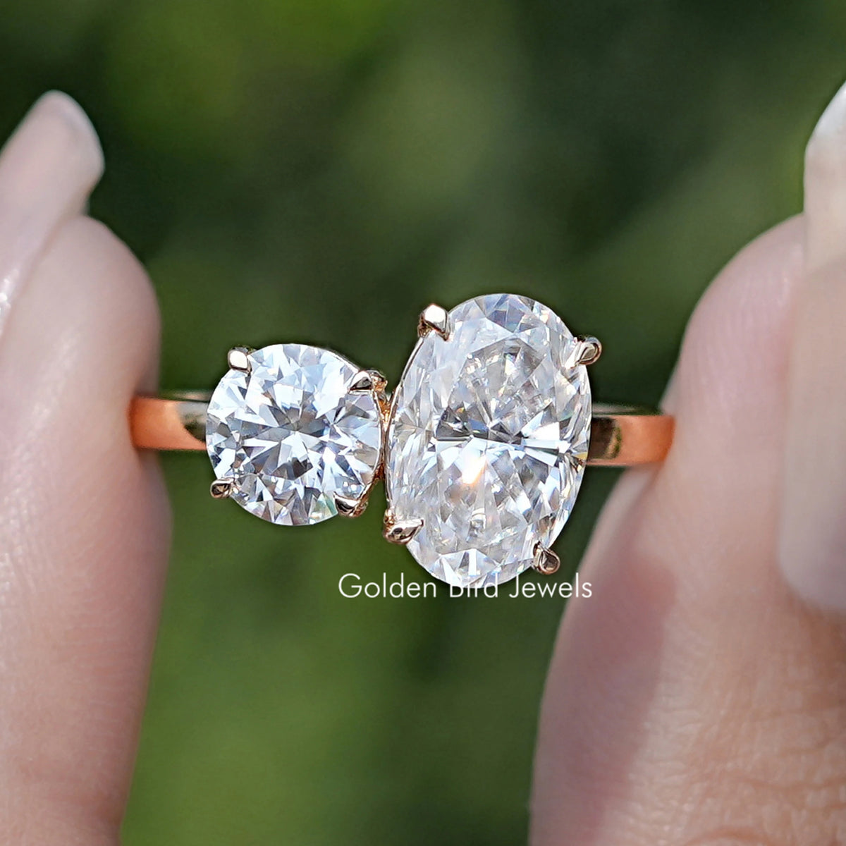 Front View Of Crushed Ice Oval And Round Cut Moissanite Toi Et Moi Ring