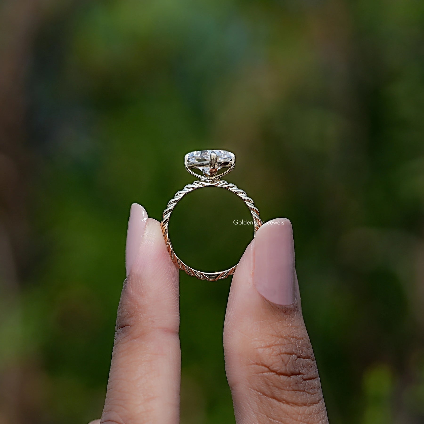 Back view of Cushion Cut Moissanite ring in secure setting