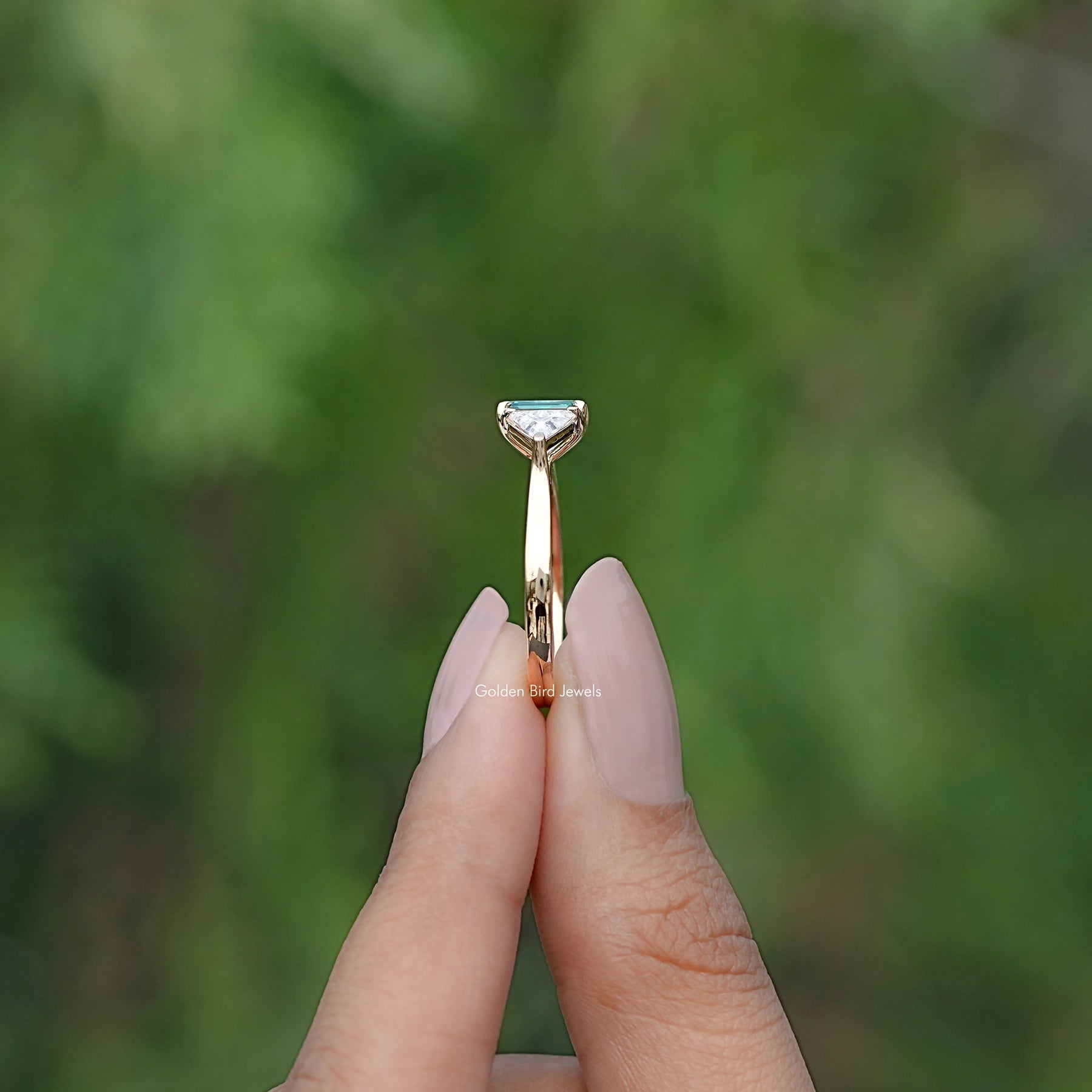 Emerald And Triangle Moissanite Three Stone Ring