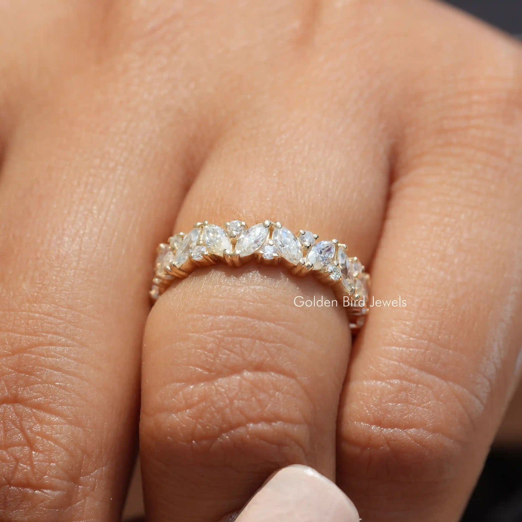 Side View of Engagement ring crafted With Marquise And Round Moissanite