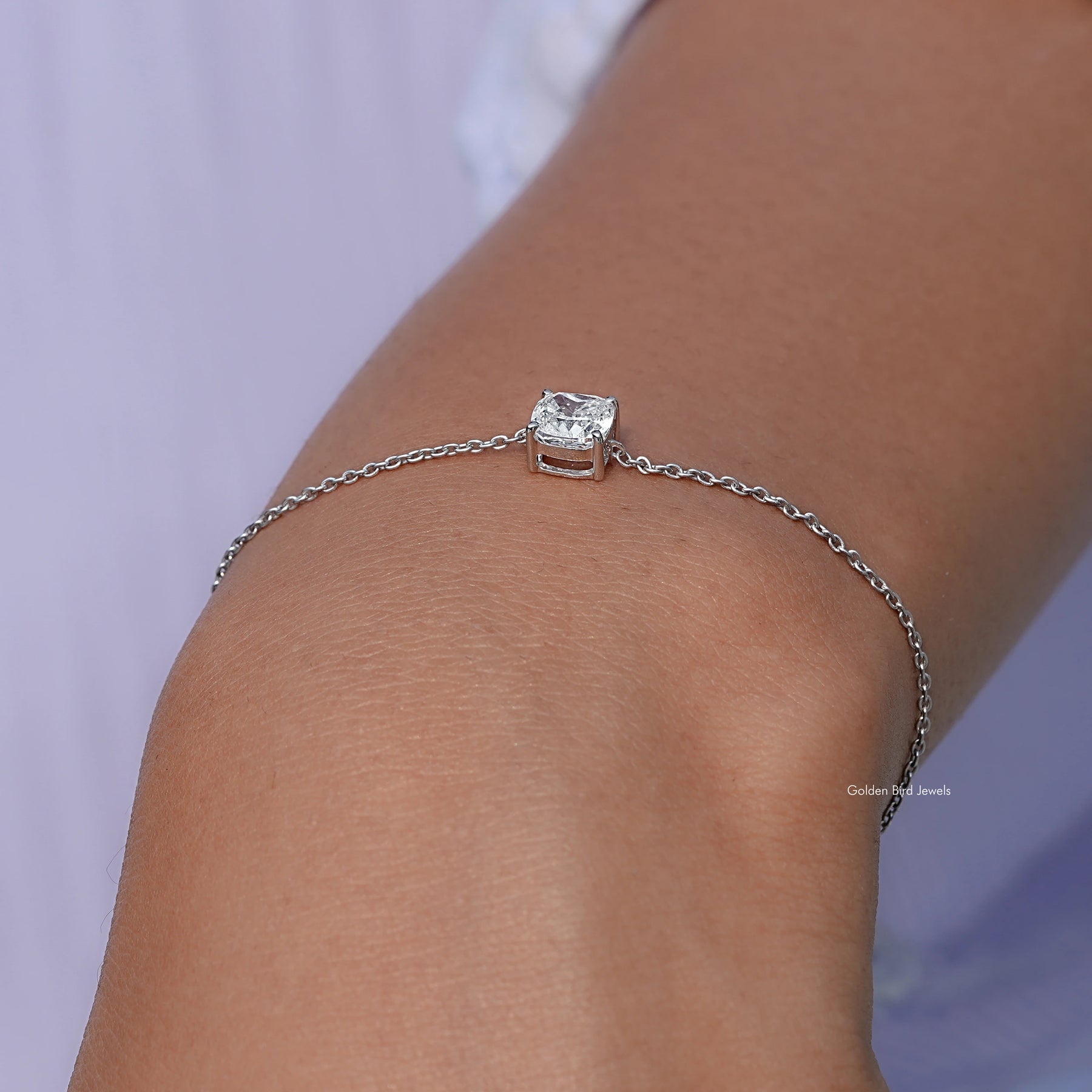 Close view of diamond chain bracelet in secure setting