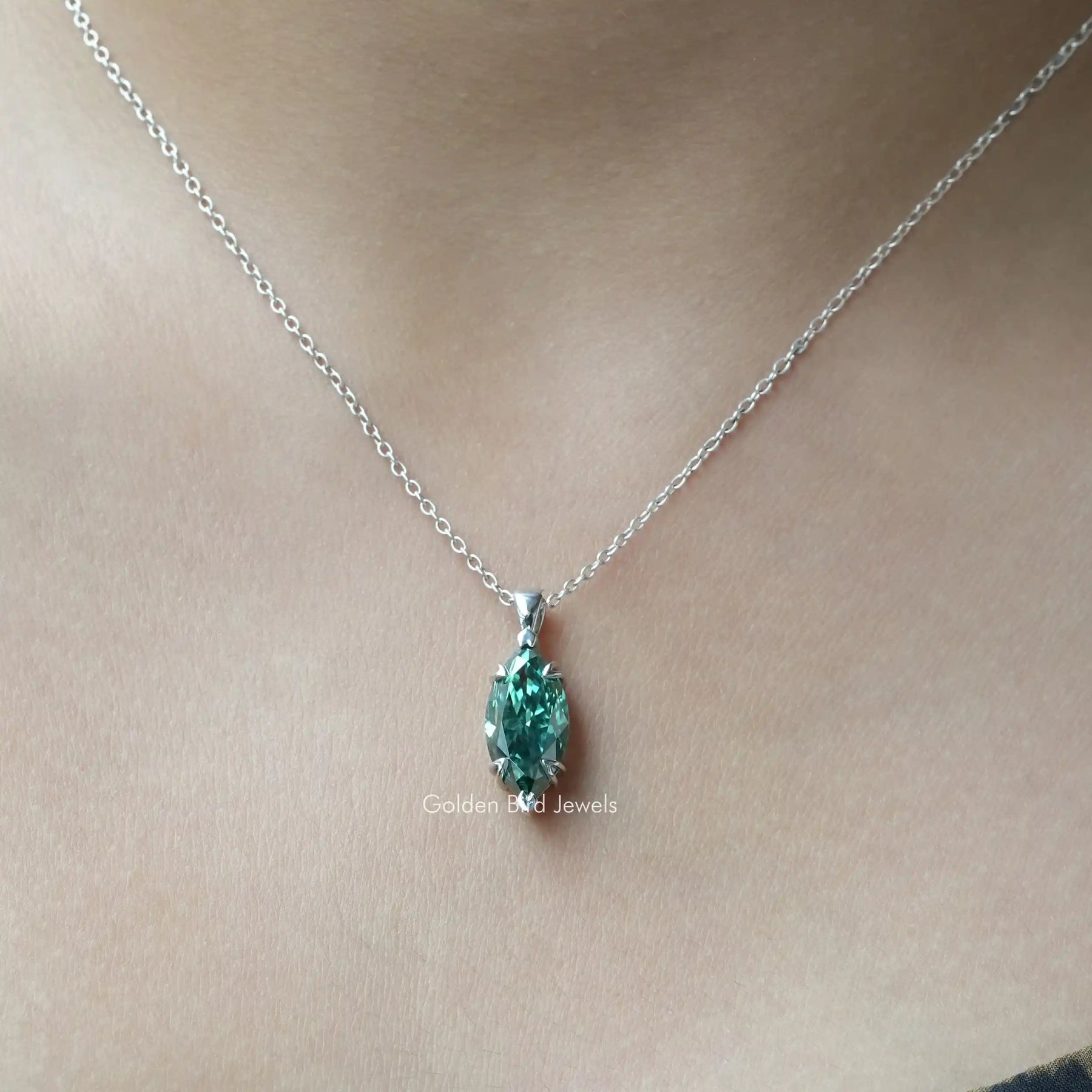 View of green Marquise cut moissanite pendant