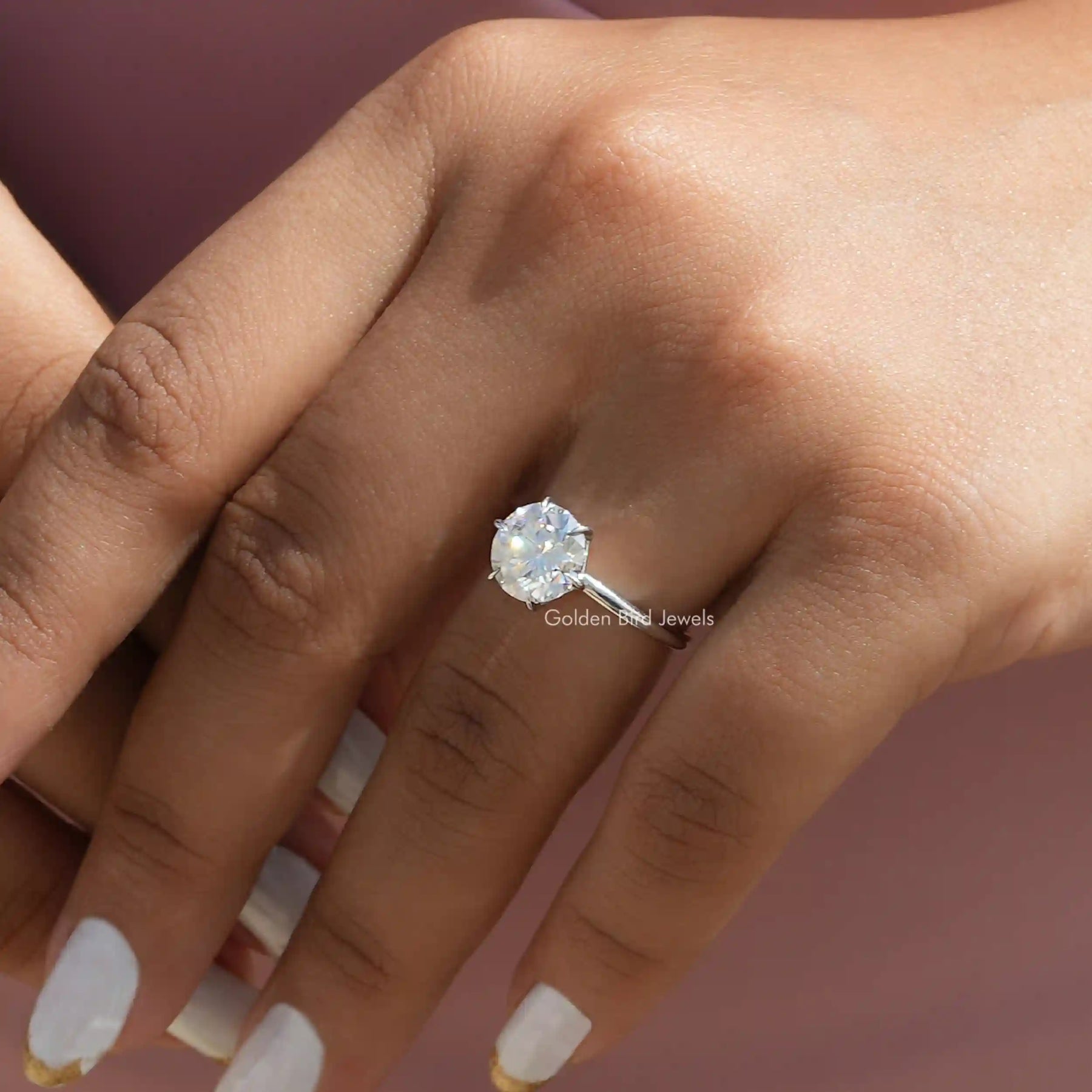 Detailed View Of Round Cut Moissanite Ring In Yellow Gold