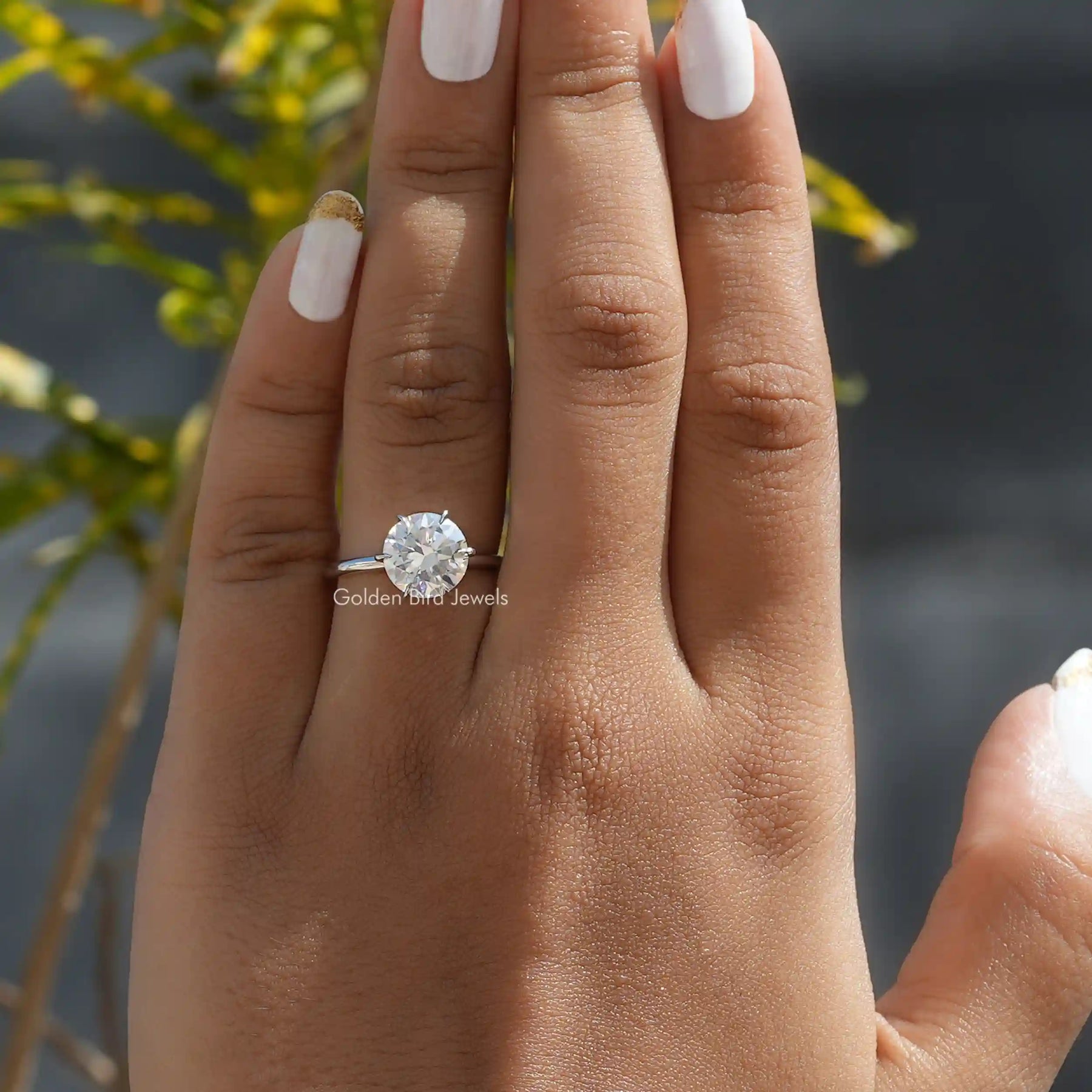 Round Cut Moissanite Solitaire Bridal Ring In Finger