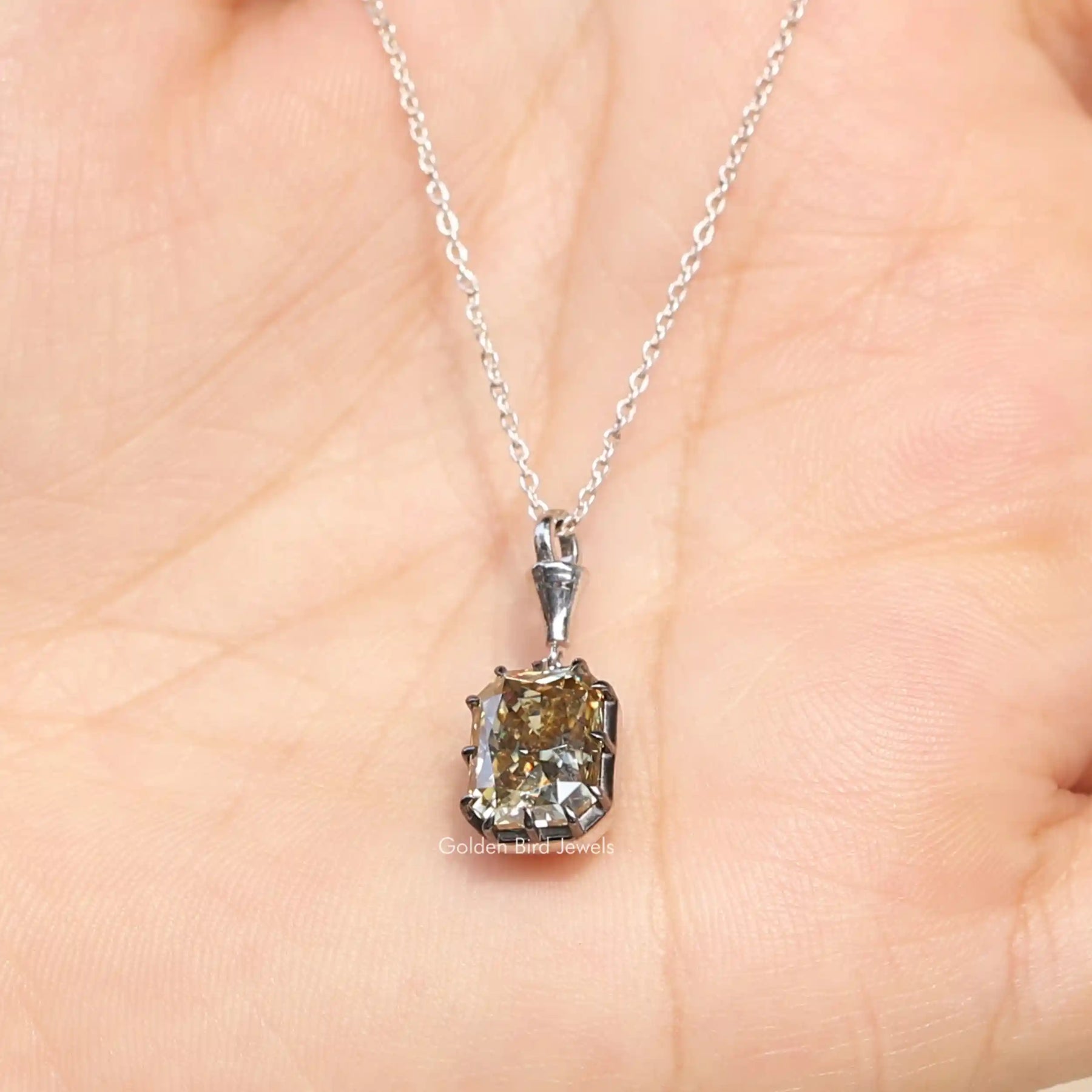 Close view of solitaire moissanite pendant for women