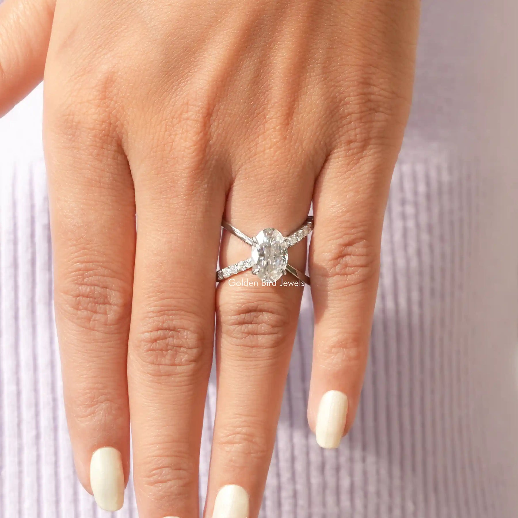 View of Crushed Ice Oval Cut Moissanite Ring In finger