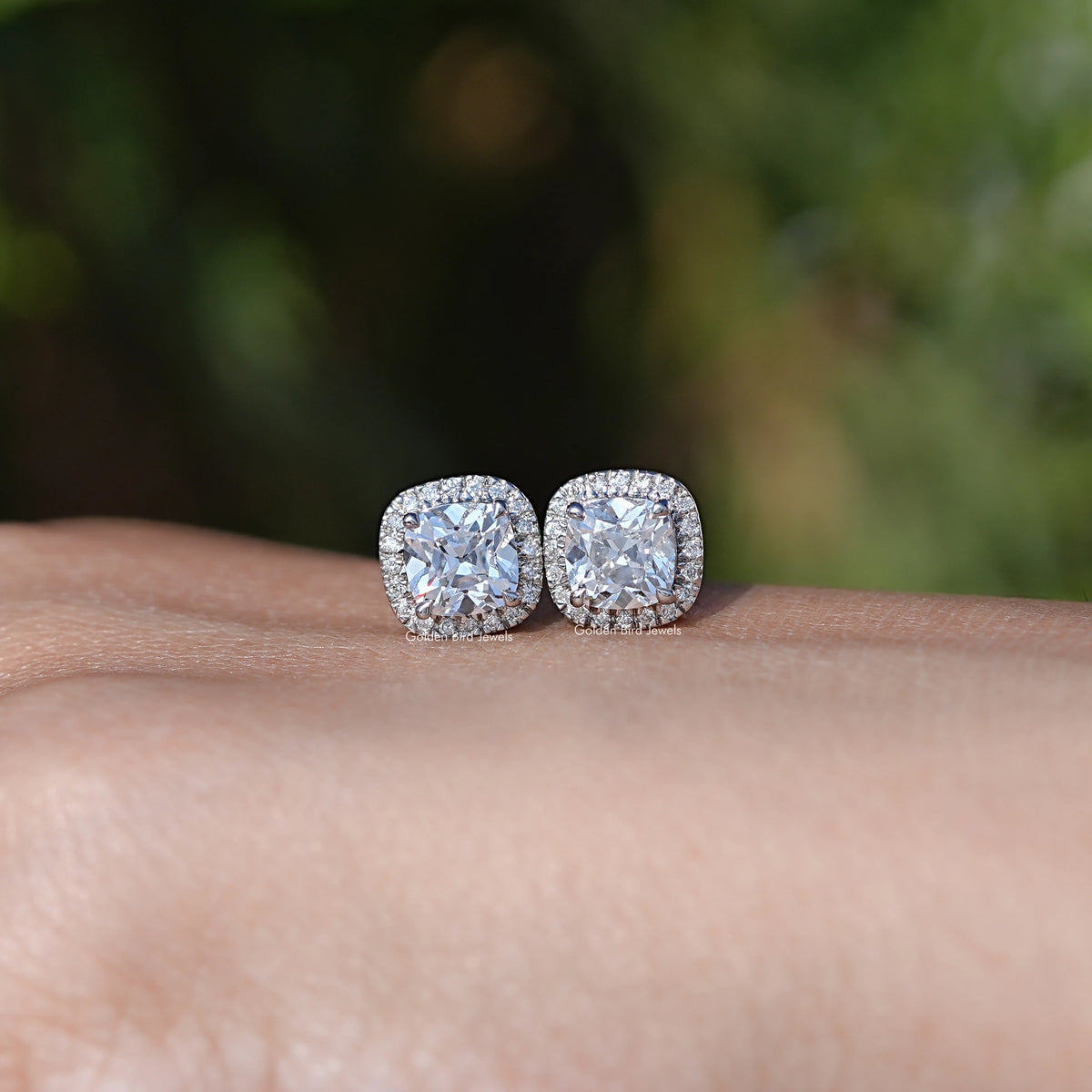 Front View of Cushion Cut Diamond Halo Stud Earrings In White Gold