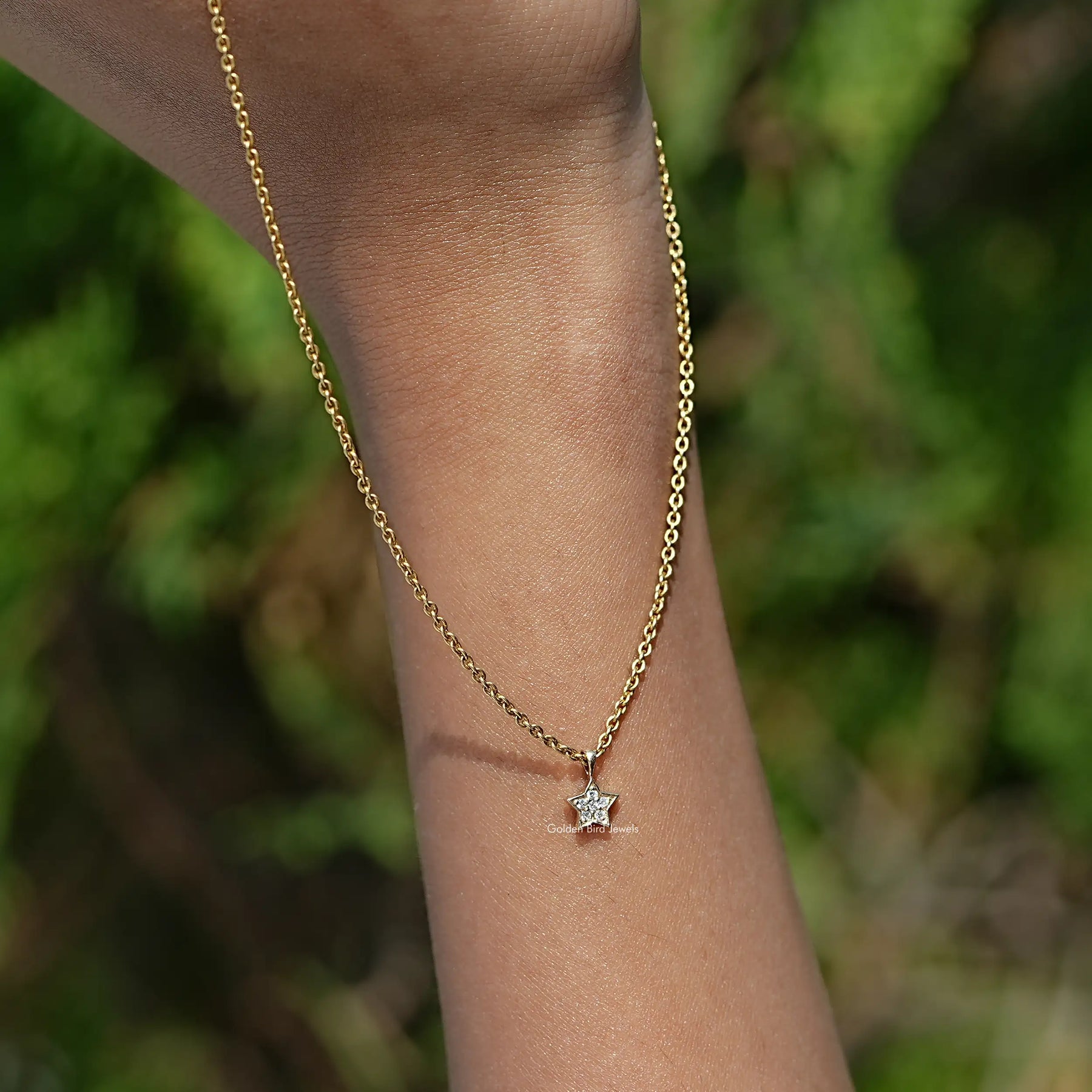View of Round Cut Lab Diamond Pave Set Pendant In Women's hand's