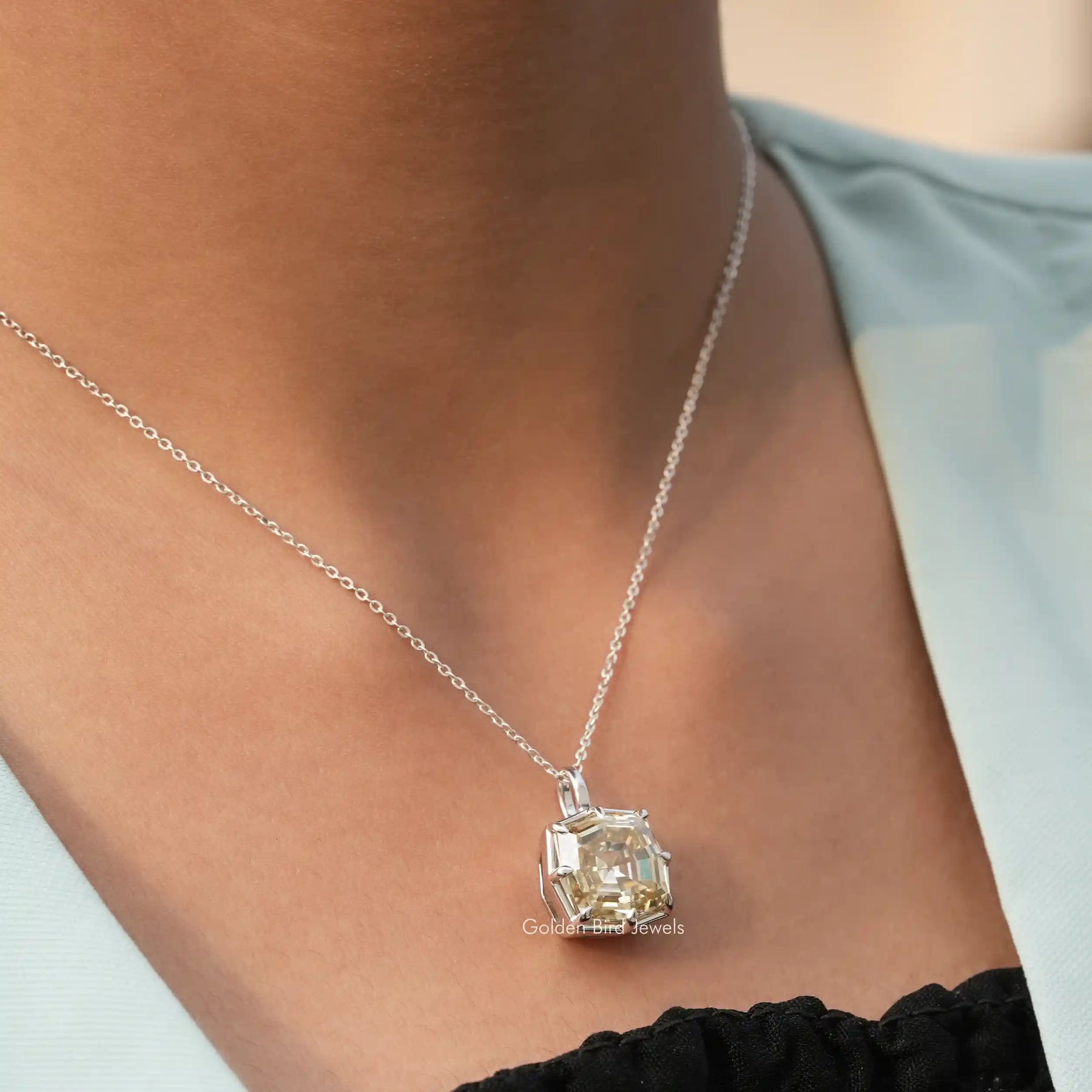 In neck view of cushion cut moissanite halo pendant