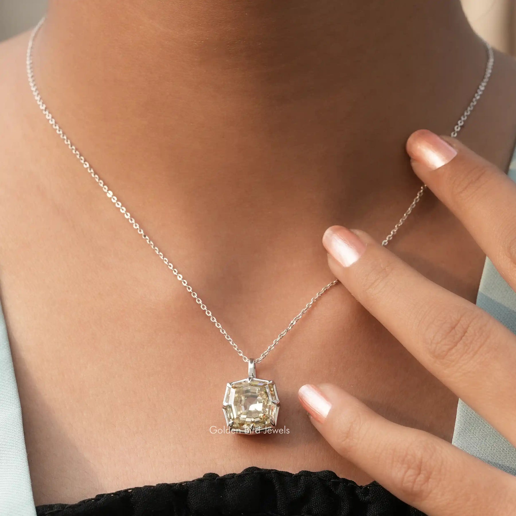 In front view of moissanite cushion cut pendant