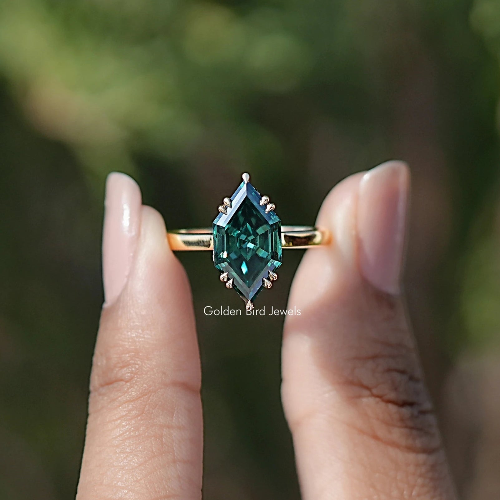 Front view of Step Cut Dutch Marquise Moissanite Solitaire Ring