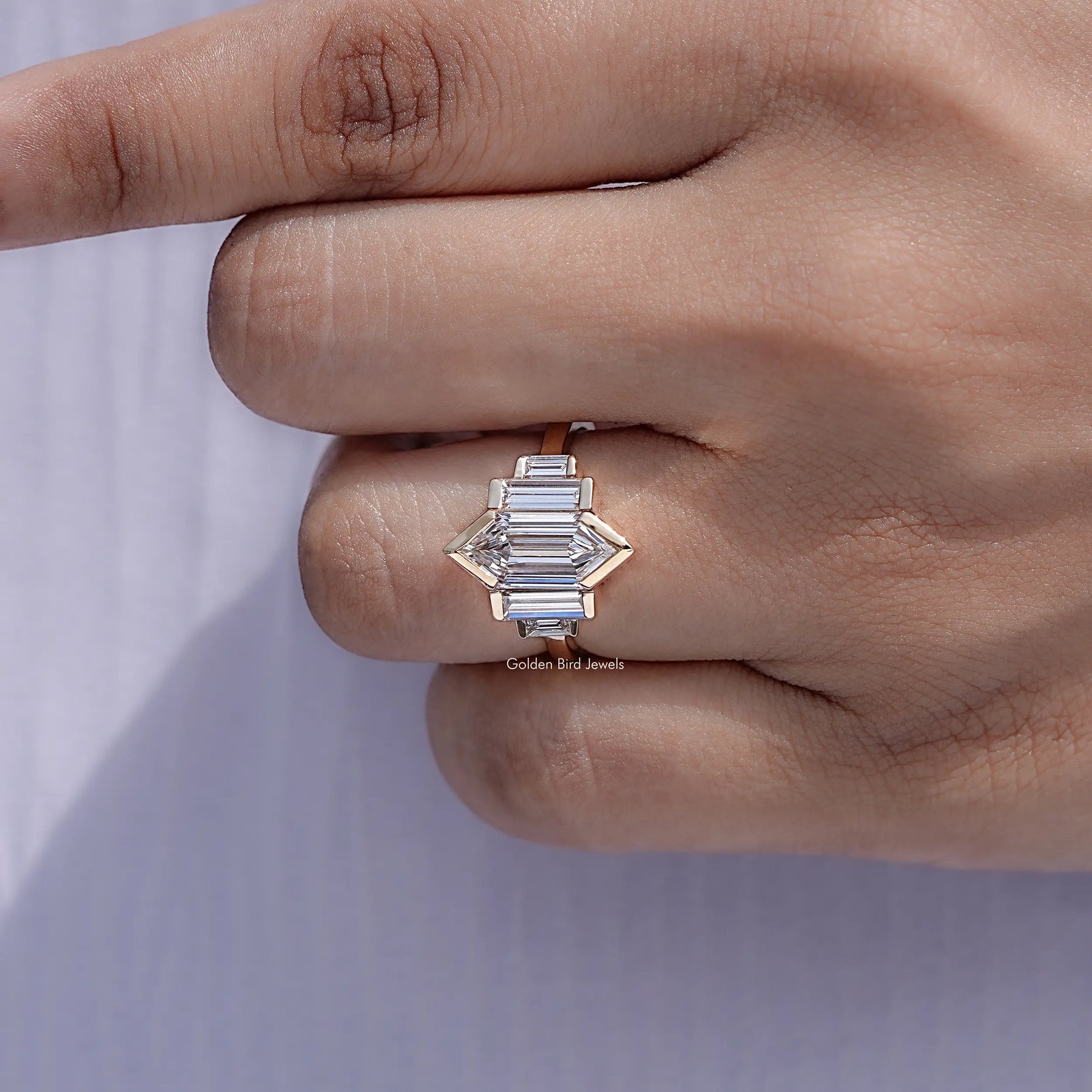 Detailed view of Step Cut Hexagon Diamond Five Stone Ring