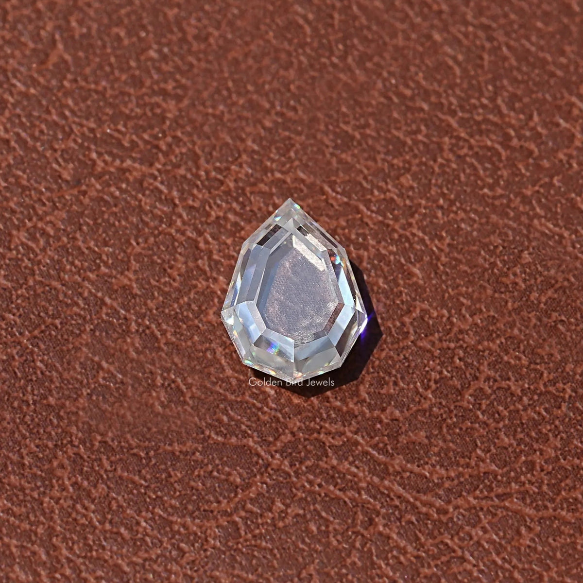 Top View of Step Cut Portrait Pear Loose Moissanite