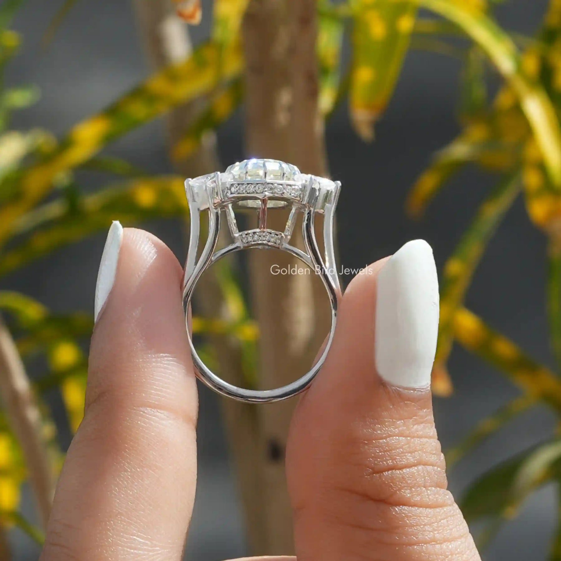 Back View of Oval Moissanite Vintage Art Deco Engagement Ring In two fingers