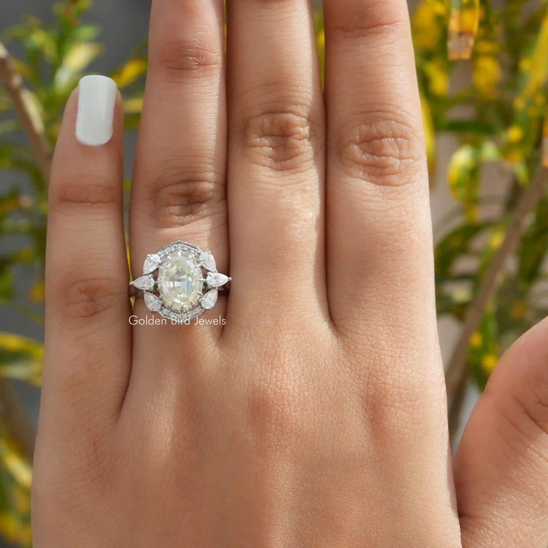 View of Step Cut Oval Moissanite Halo Vintage Ring In White Gold