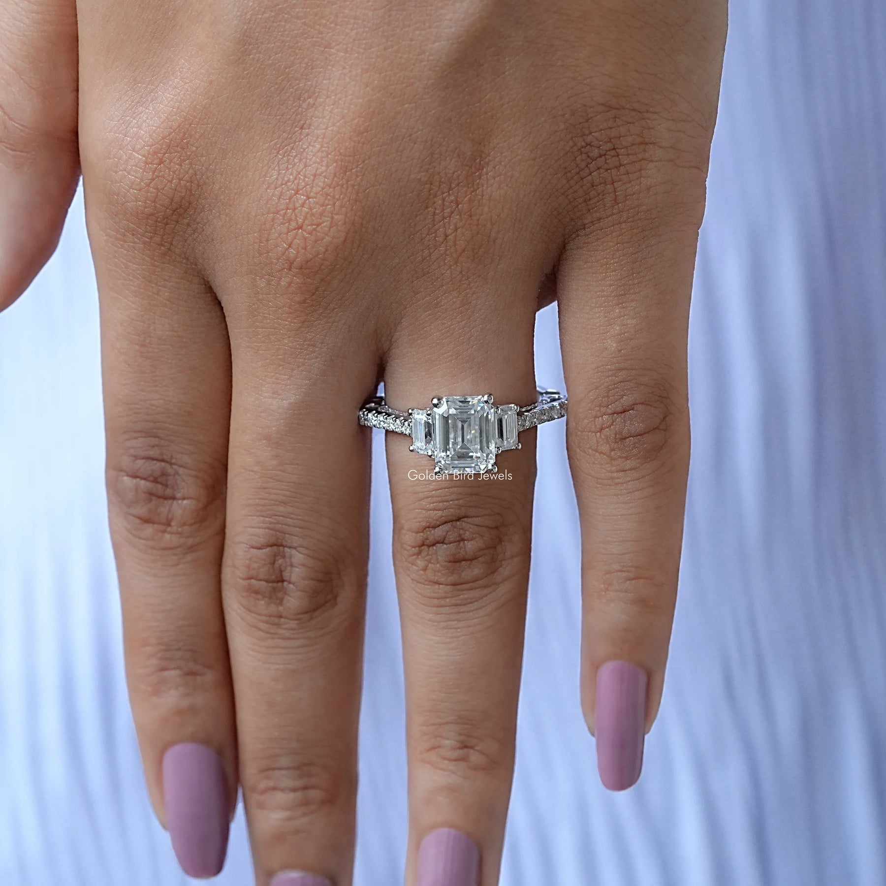 View of Emerald Cut Moissanite Engagement Ring In Finger