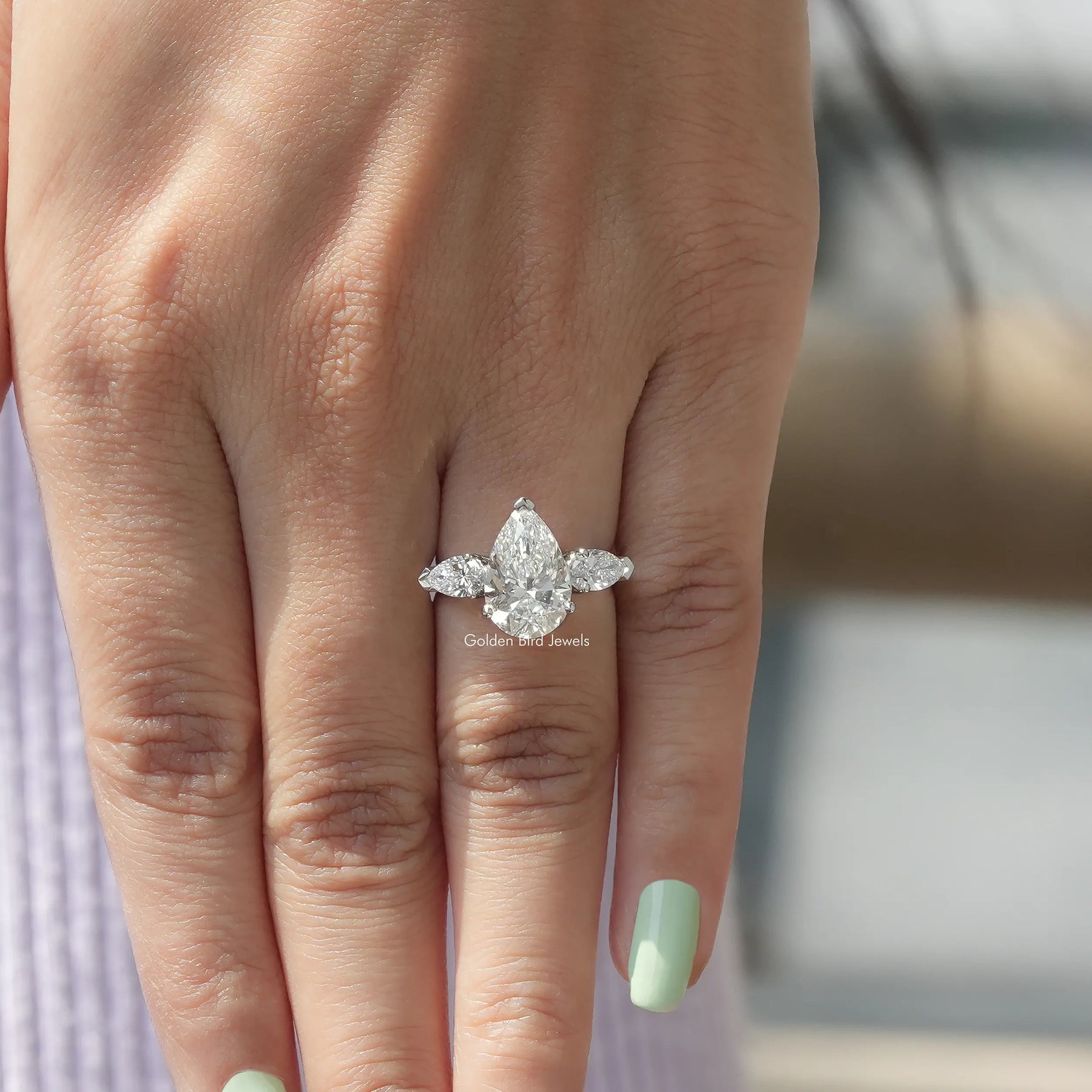View of Pear Cut Diamond Engagement Ring In finger