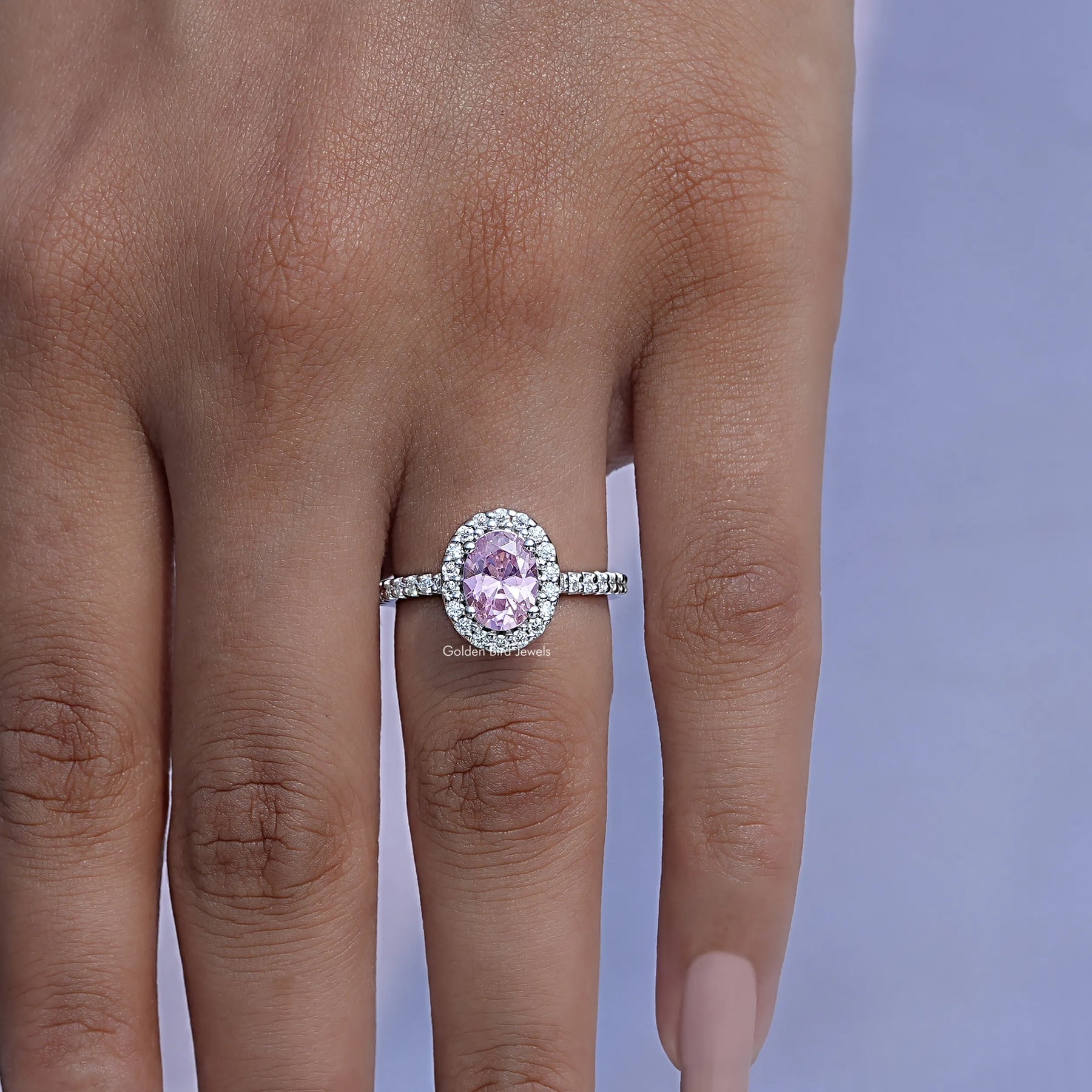 Oval Cut Gemstone Ring In finger