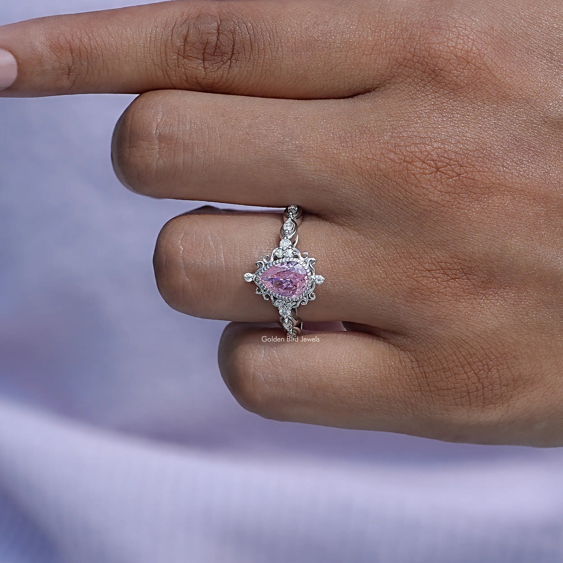 Detailed View Of Pink Tourmaline Pear Shaped Gemstone Accent Stone Ring