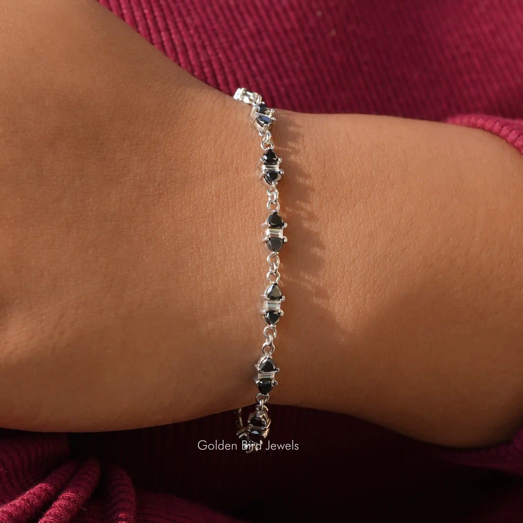 Detailed view of trillion shaped moissanite bracelet