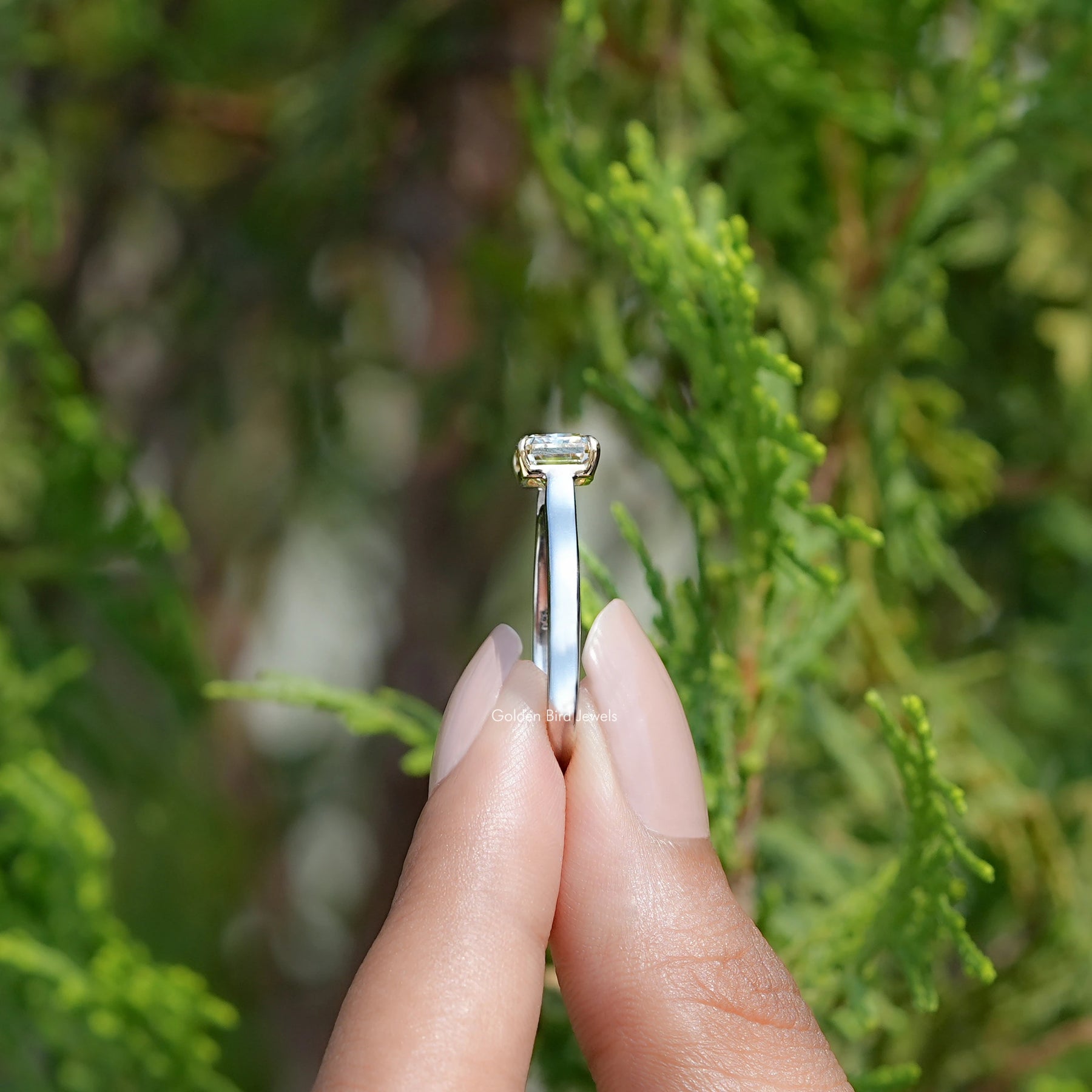 Side View of East West Yellow Radiant moissanite Solitaire Ring