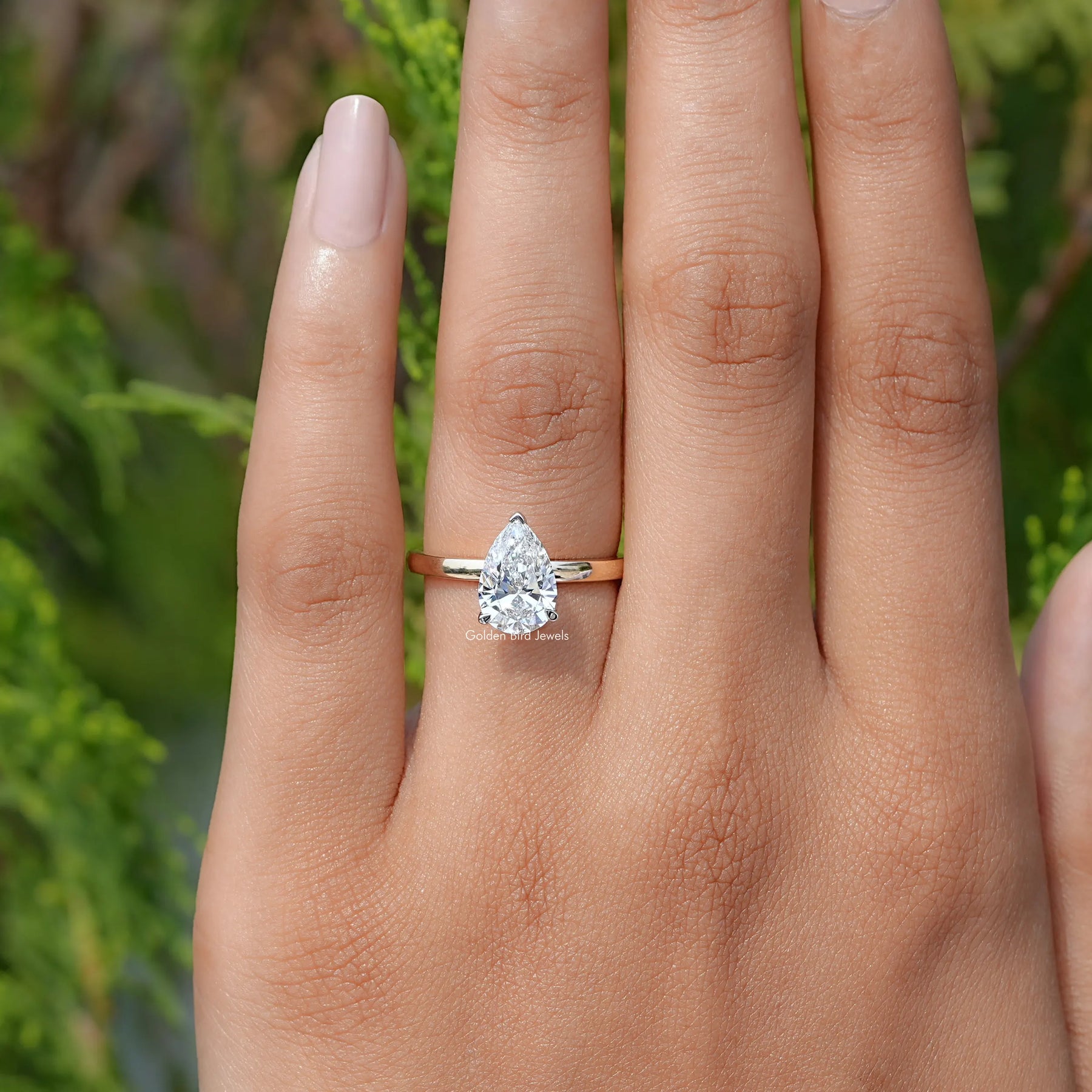 View of Round Cut Diamond Hidden Halo Engagement Ring In Yellow Gold