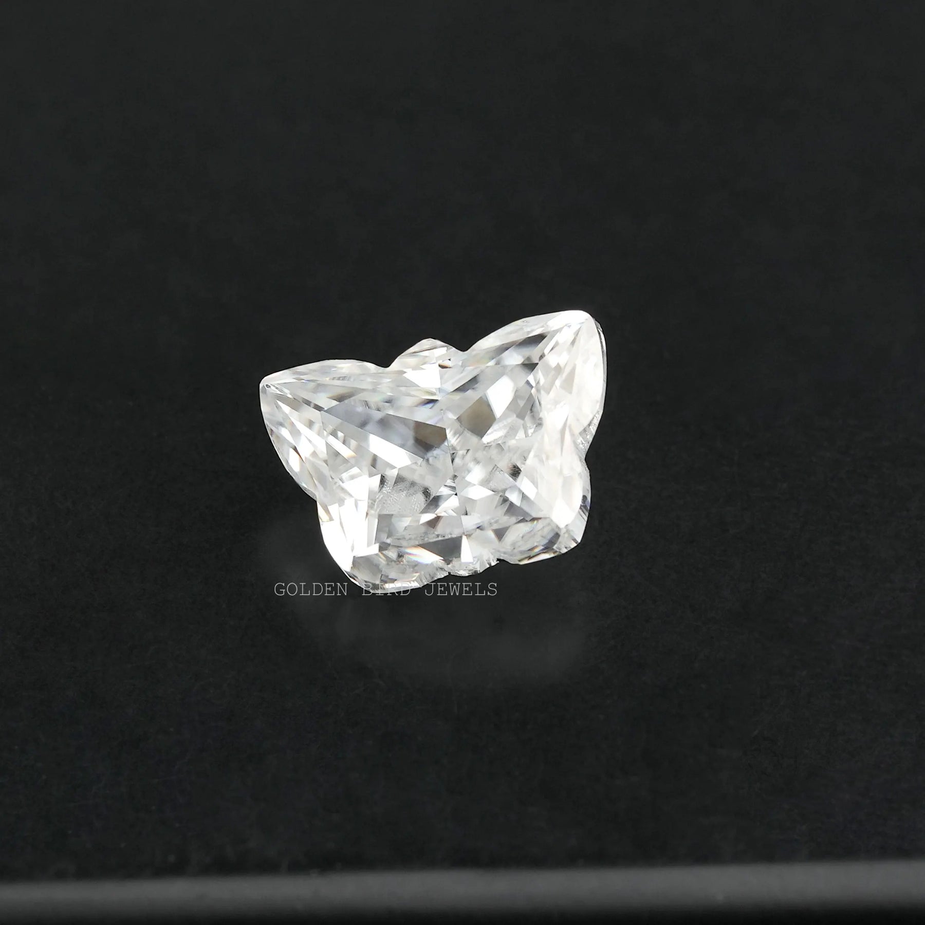 View of Antique Cut Butterfly Loose Moissanite Stone In White