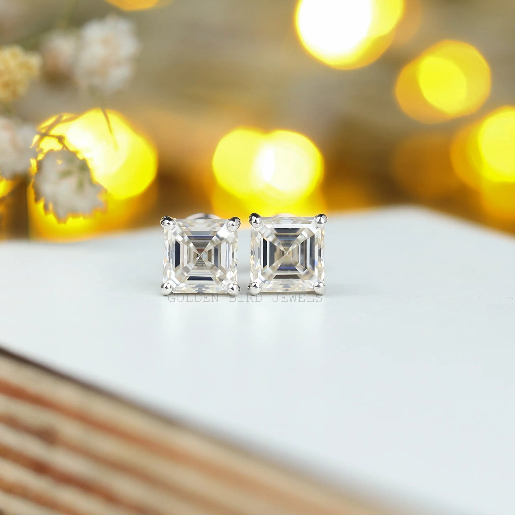 Front view of asscher cut stud earrings