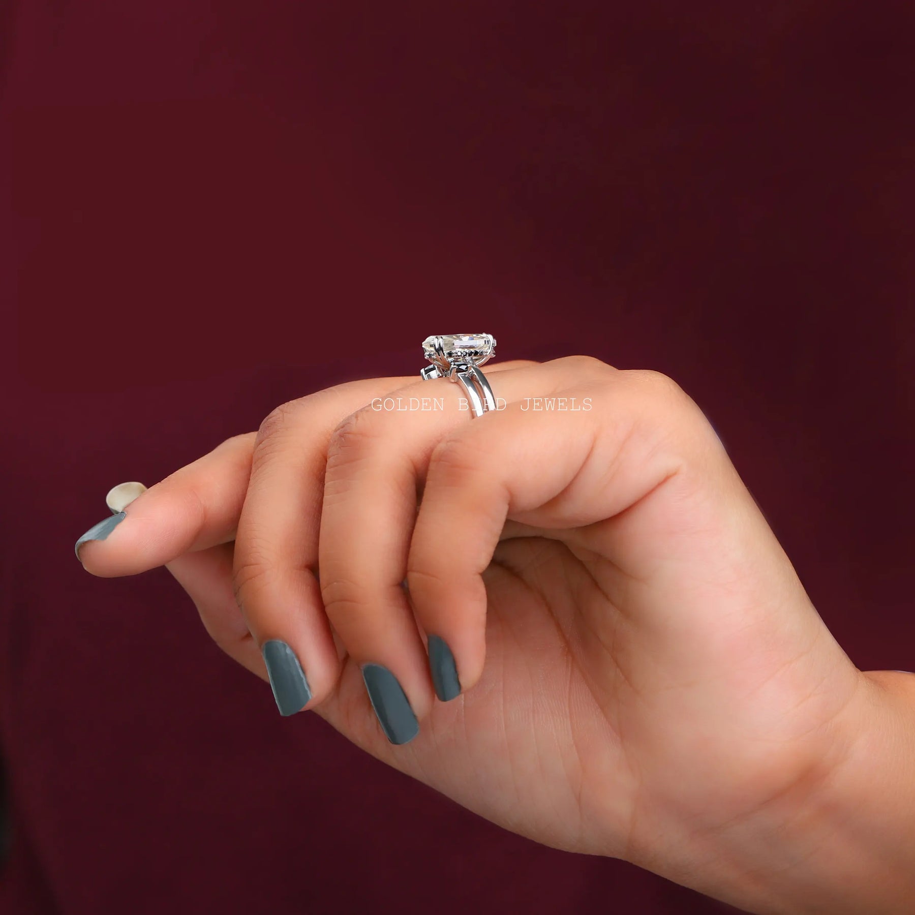 Marquise Cut Hidden Halo Trillion Ring In Finger