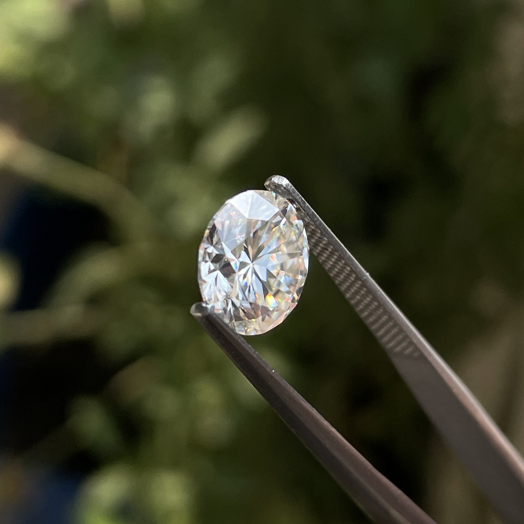 Side View of Round Cut Loose Moissanite In White