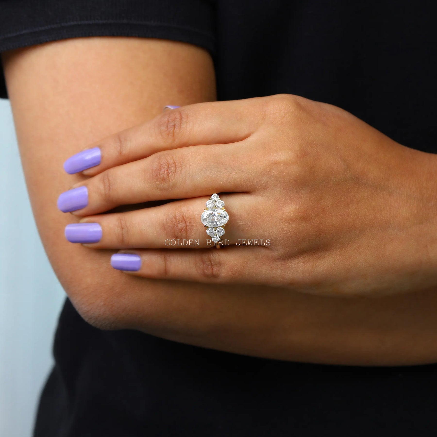 An oval moissanite engagement ring in white gold