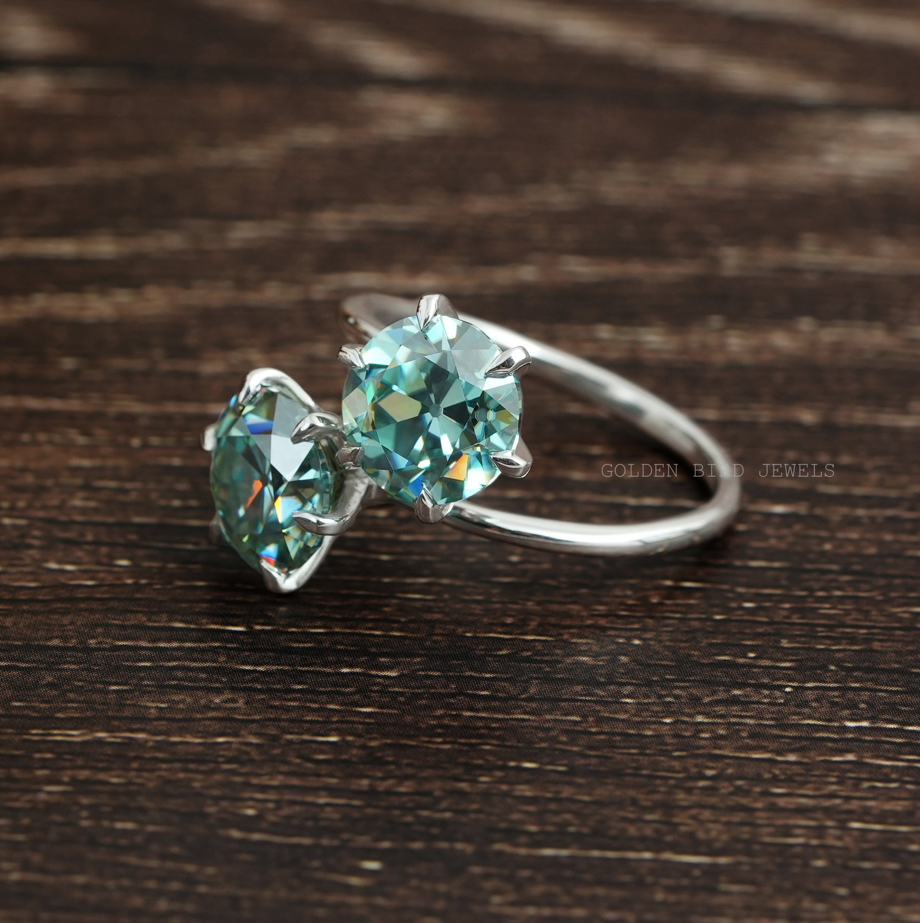 View of Moissanite engagement ring in bypass patern